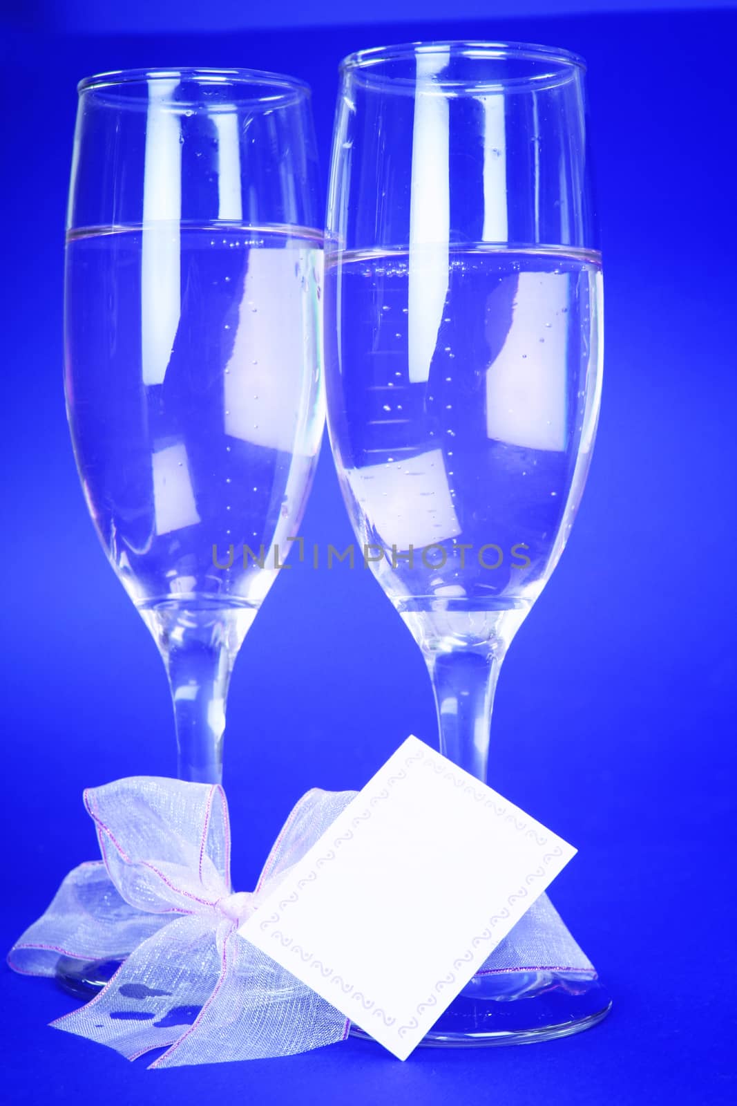 Couple celebrating valentine's day with champagne.