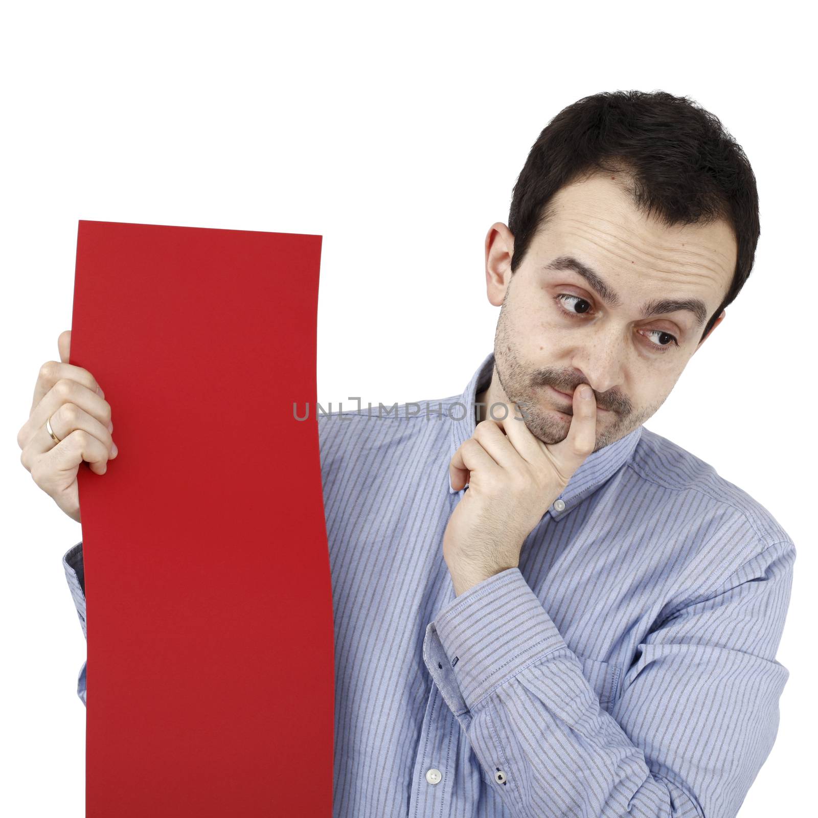 Young man holding a blank piece of paper