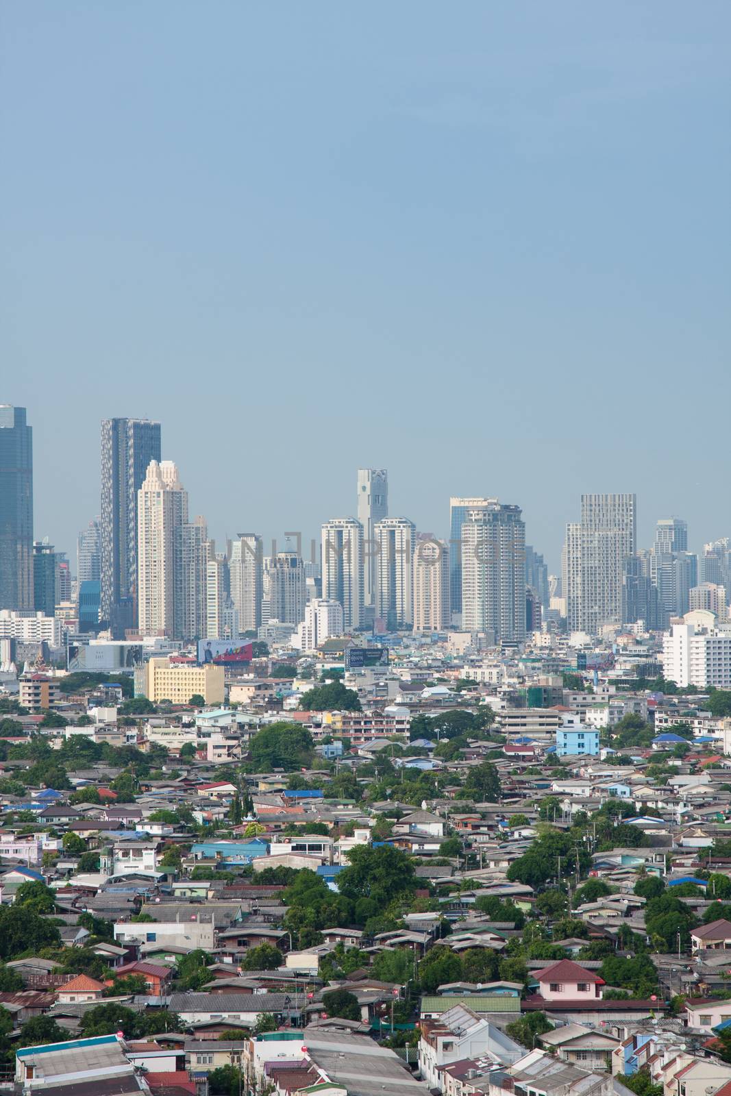 Bangkok city with tall buildings and small houses. The residential density.