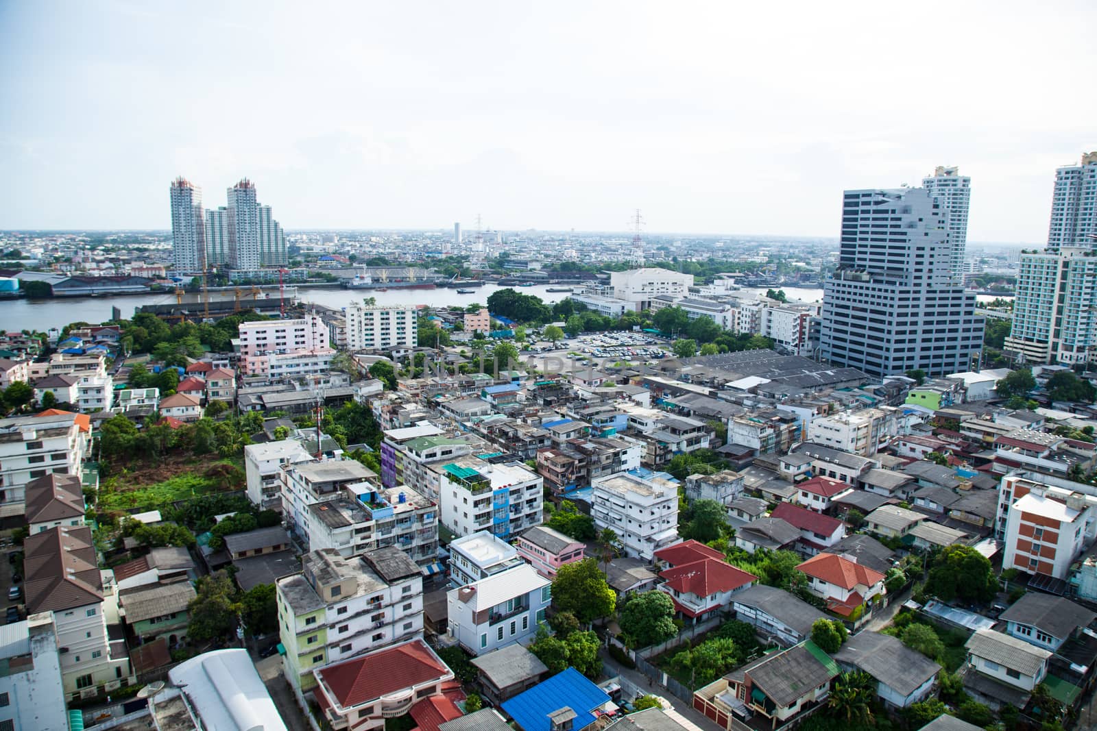 Bangkok city with tall buildings and small houses. The residential density.