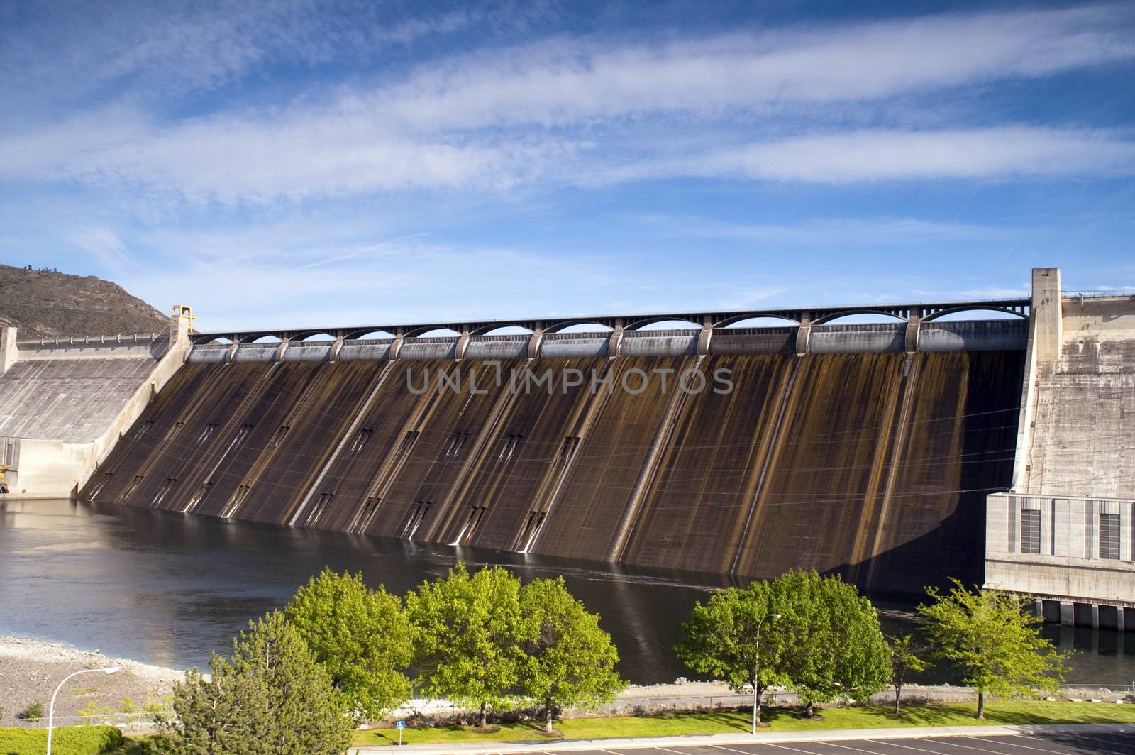 The Grand Coulee Dam under a blue sky