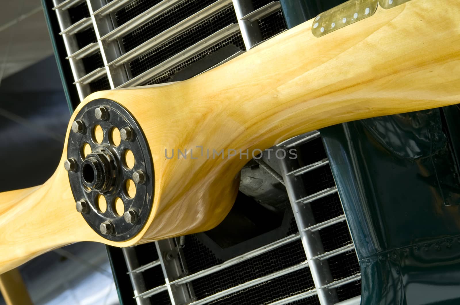 A propellor attached to the front of a bi-plane