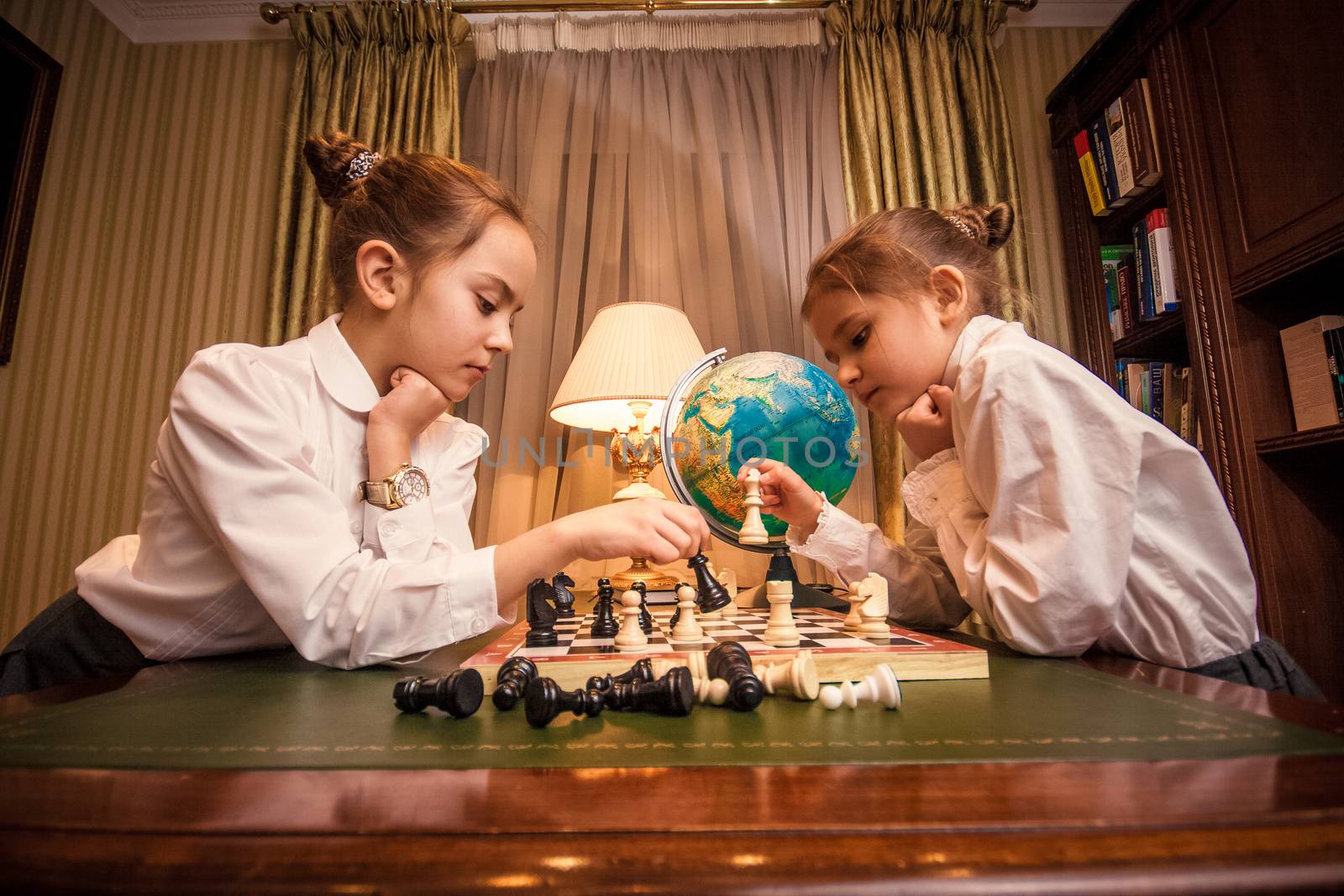  girls playing chess by Kryzhov