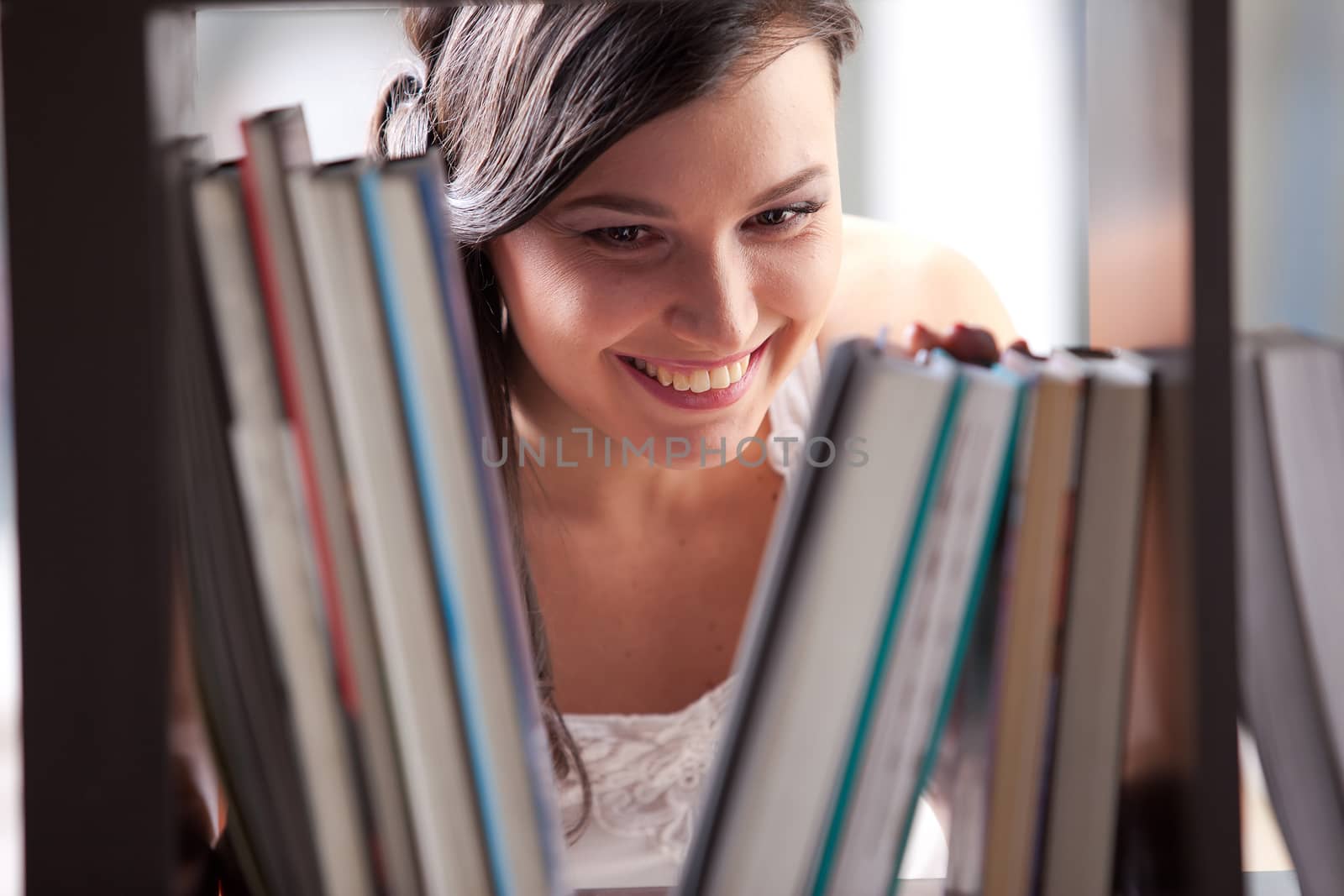 student studying in the library  by Astroid