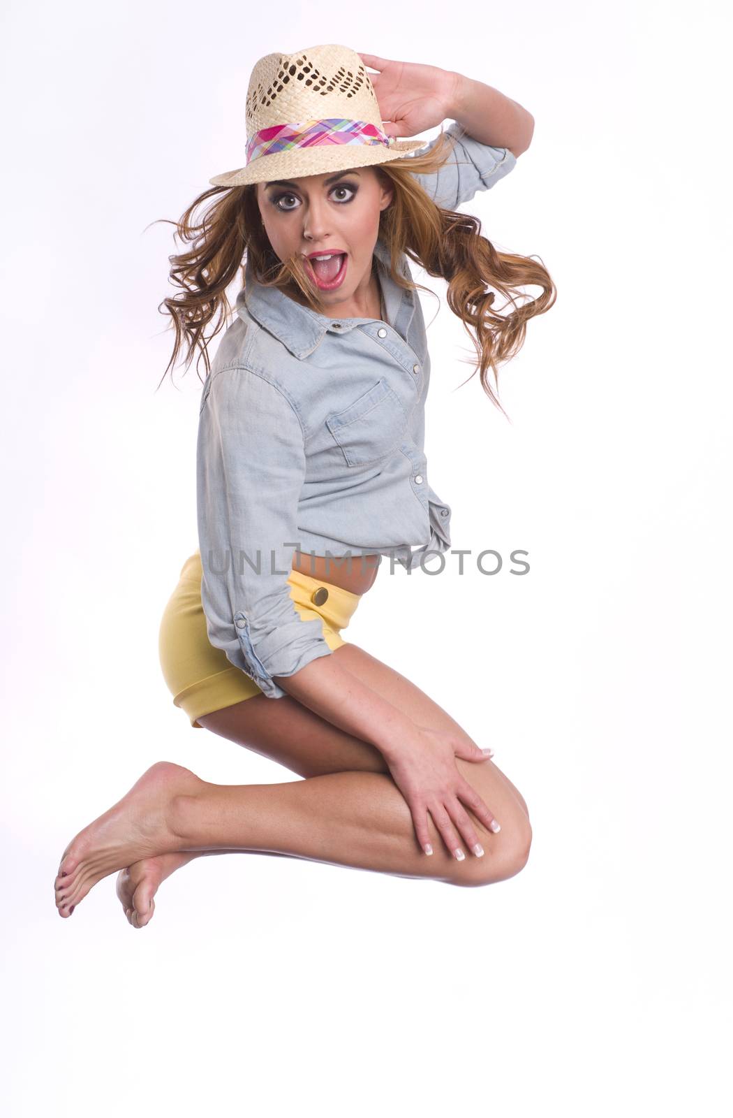 Hipster woman in mid air with excited look