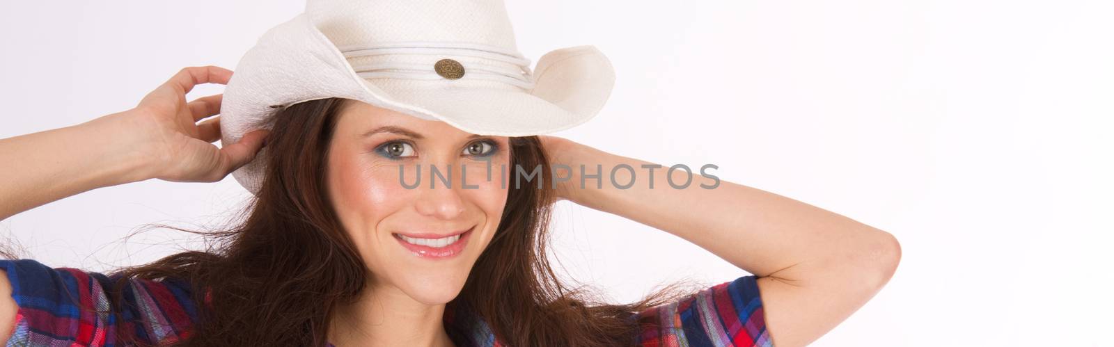Portrait of a Western Woman messing with her hat