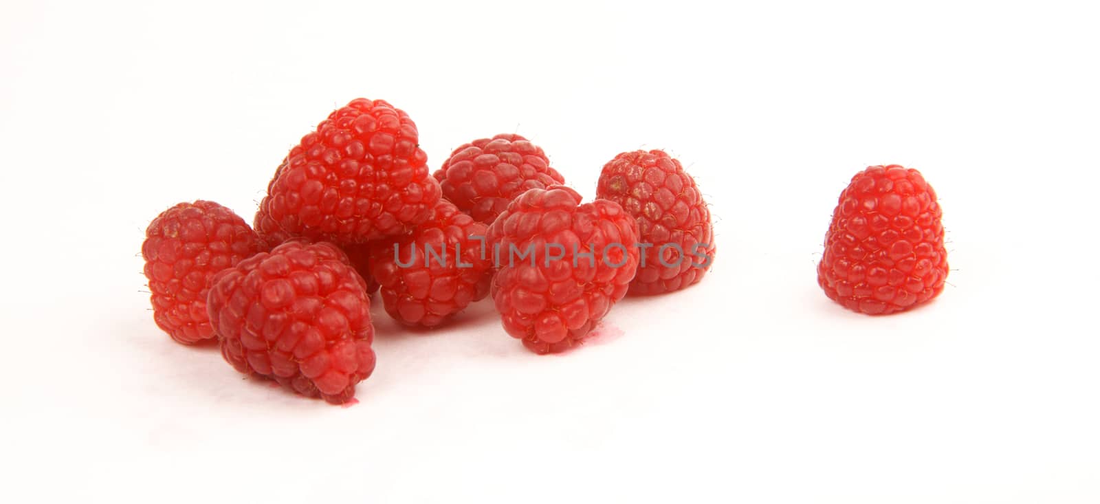 Fruit Food Raspberries in a Pile on White by ChrisBoswell