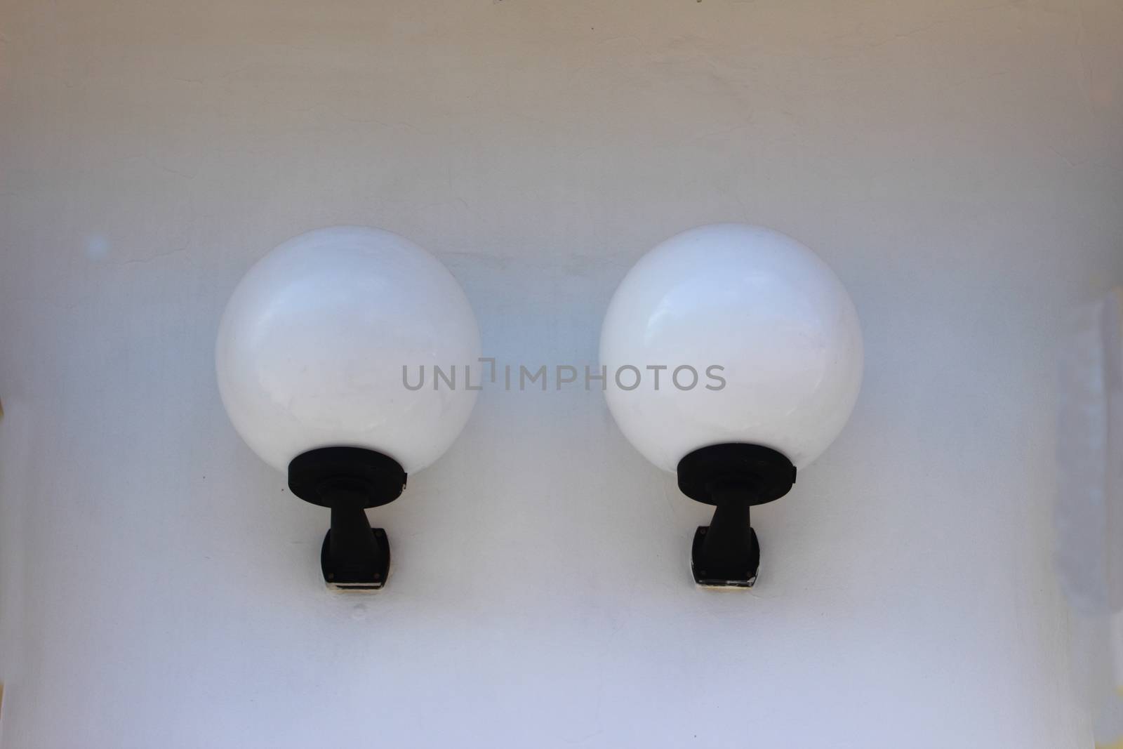 On two wall light decorative lamp shades with round
