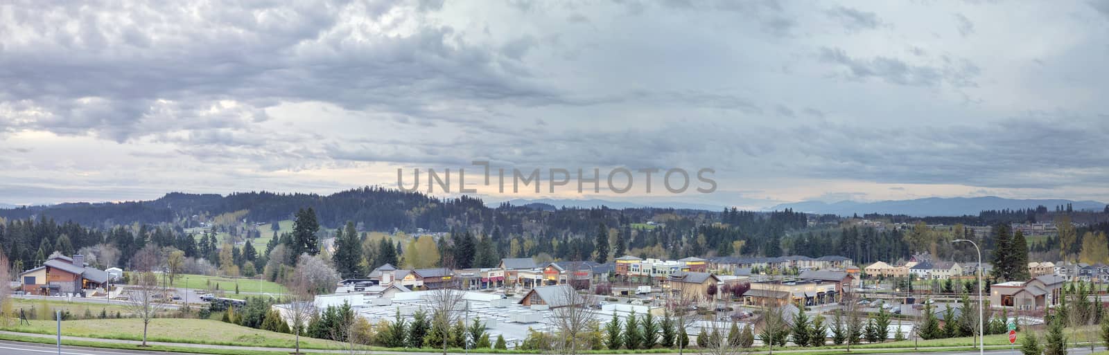 HAPPY VALLEY, OREGON - APRIL 3, 2014: City of Happy Valley downtown with city hall and shopping center panorama in the morning. Happy Valley is located in Clackamas County Oregon and incorporated in 1965.