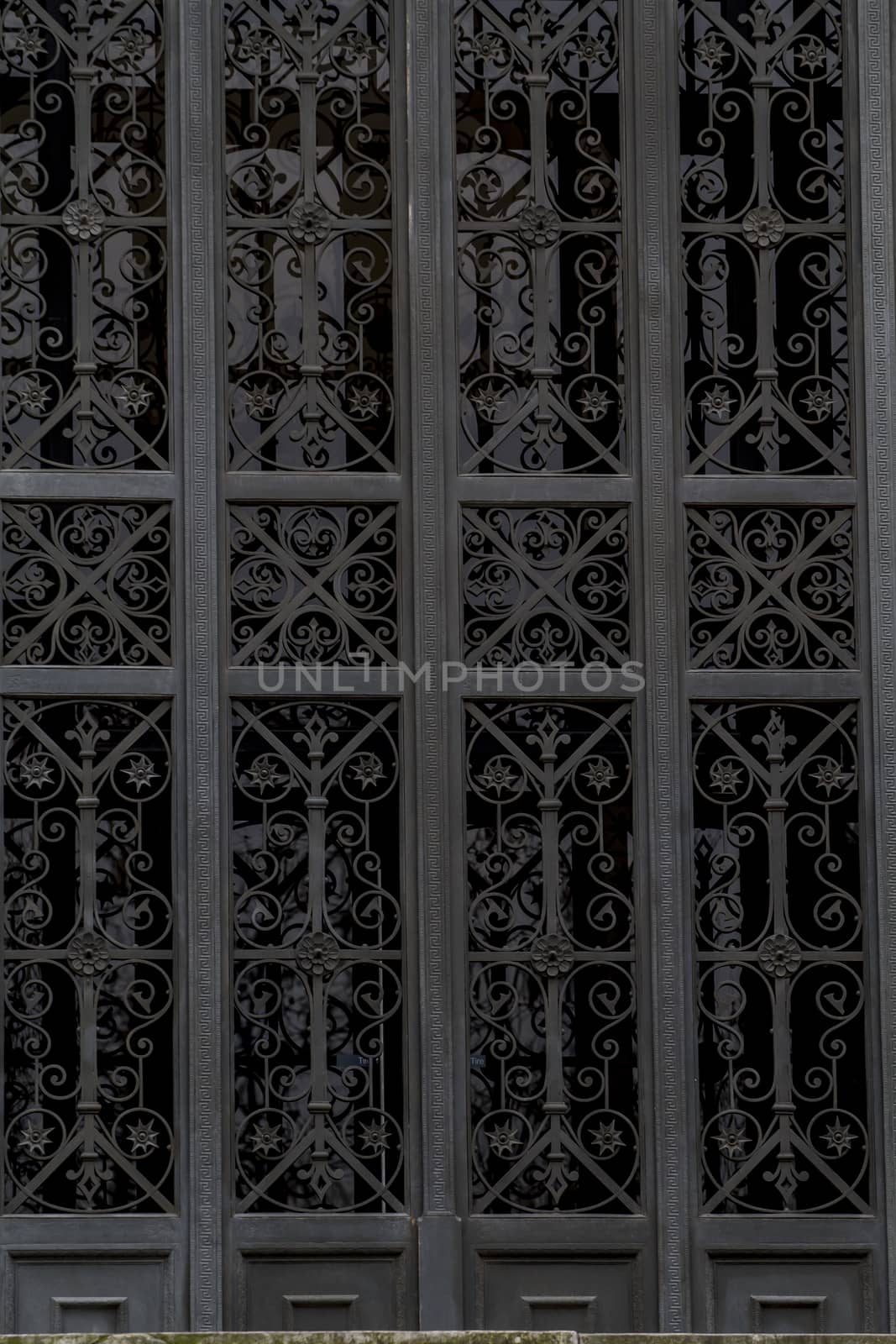 Iron fence, National library facade in Madrid, Spain by FernandoCortes