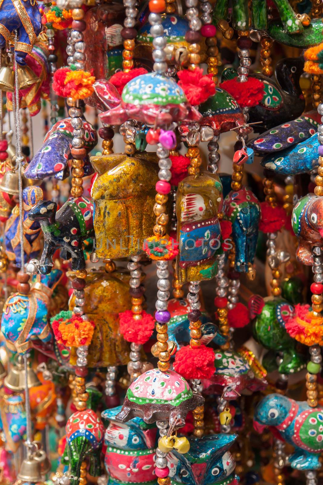 Colorful handmade hanging decorative chains in a local market India