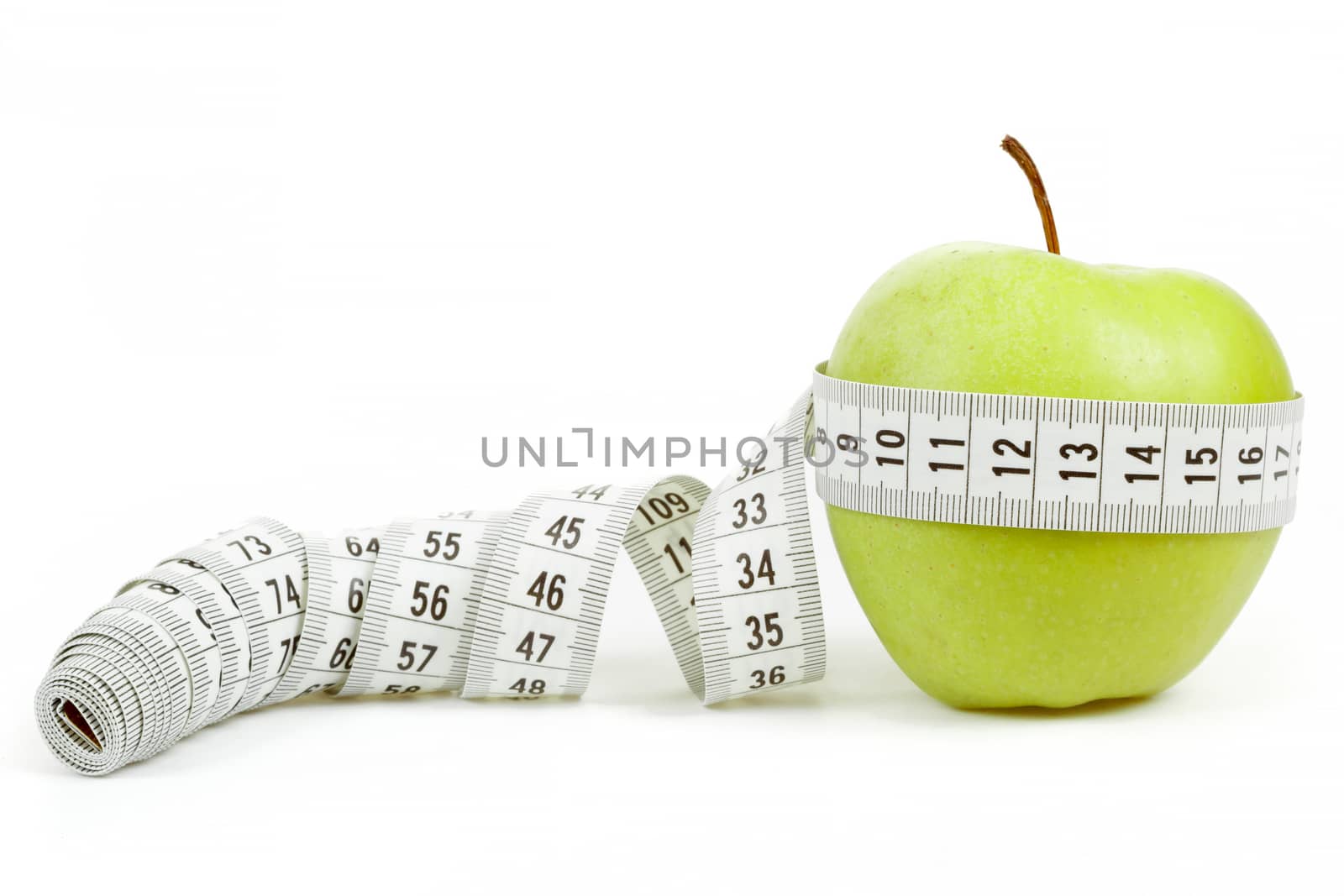green apple with a measuring tape and heart symbol isolated on white background 