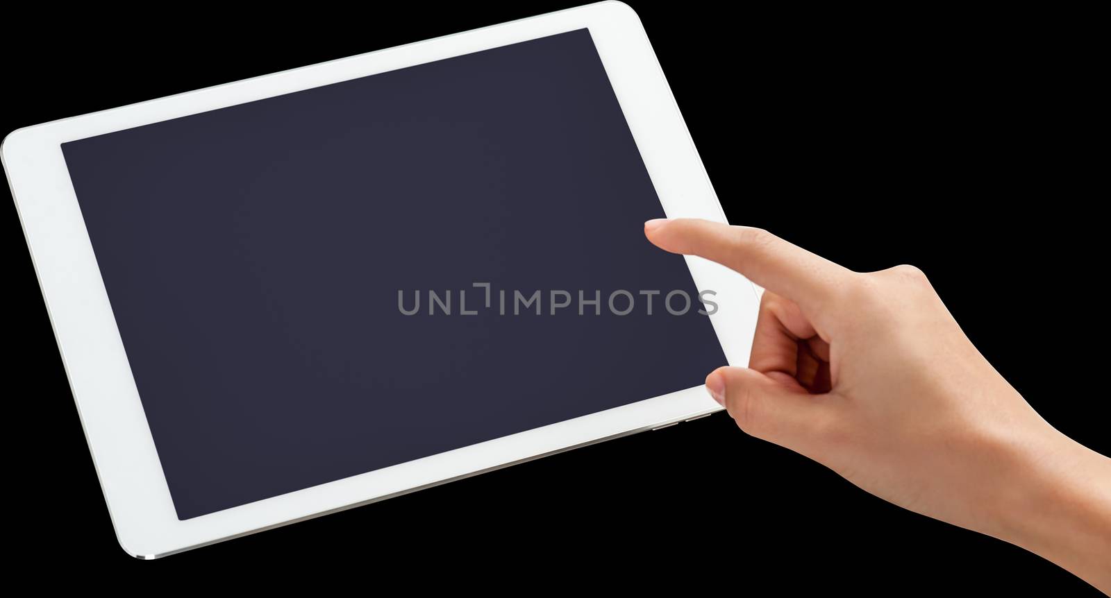 Womans finger pointing on tablet screen