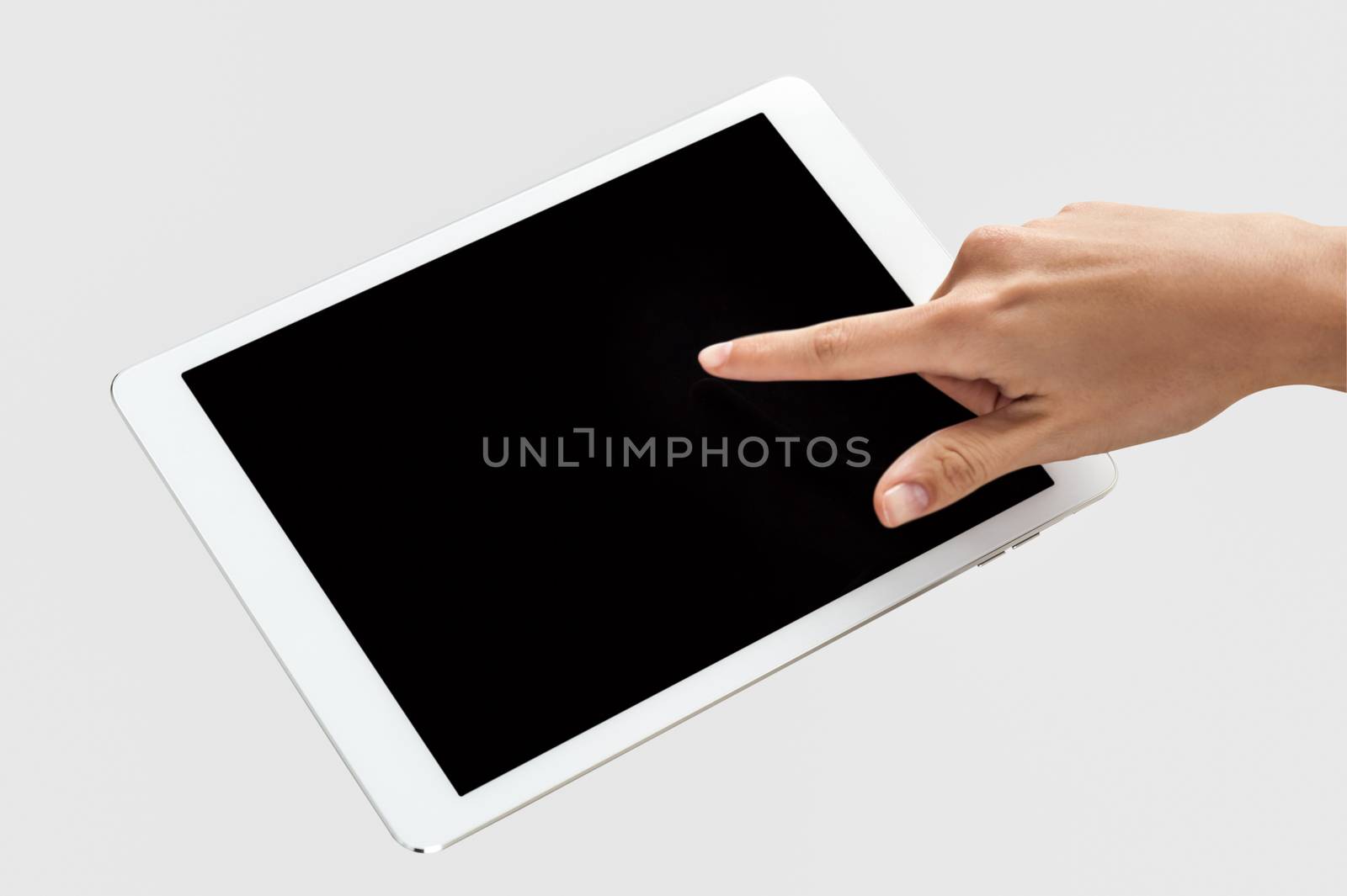 Finger pointing on tablet screen
