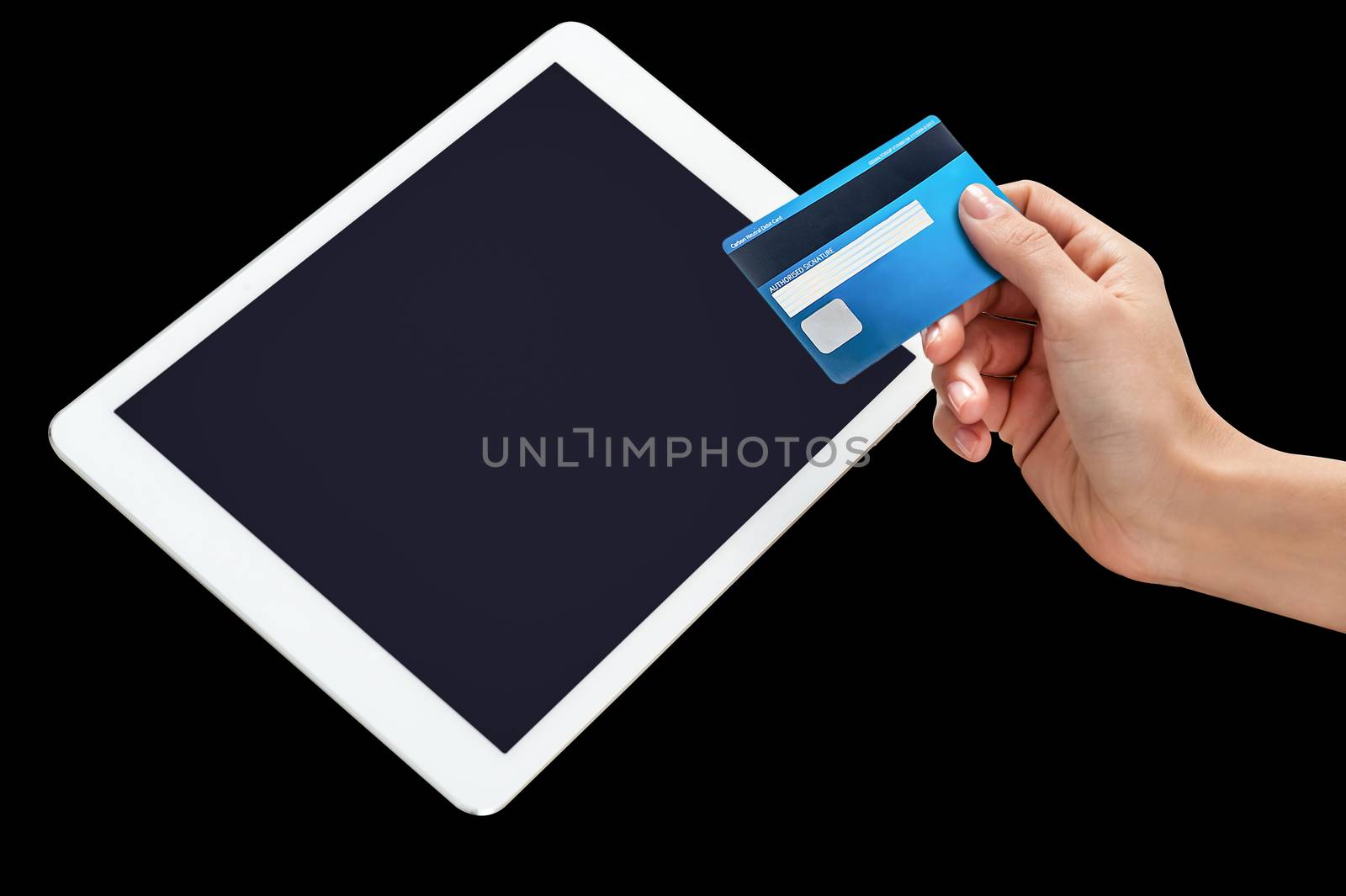 Human hand holding credit card and tablet pc device