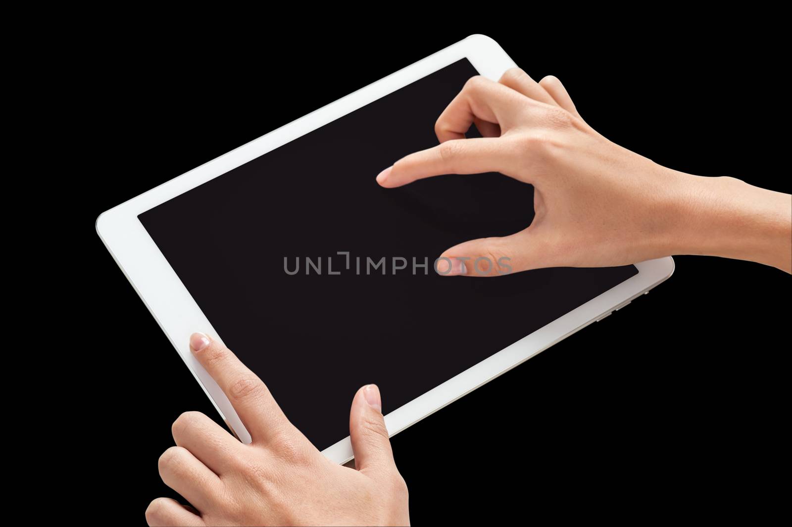 Fingers touching digital tablet screen by stockyimages