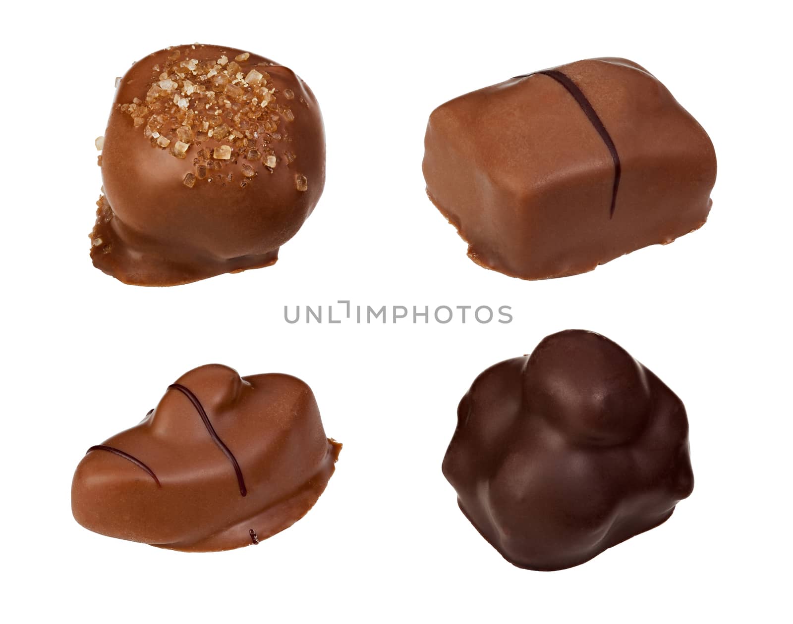 Candies made of dark and milk chocolate. File contains clipping path