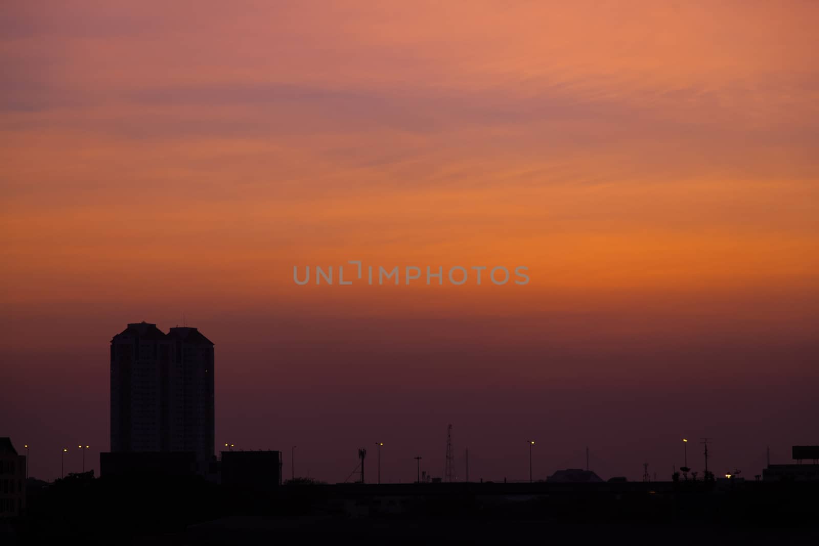 Buildings in the city of Bangkok in the evening, near dusk.