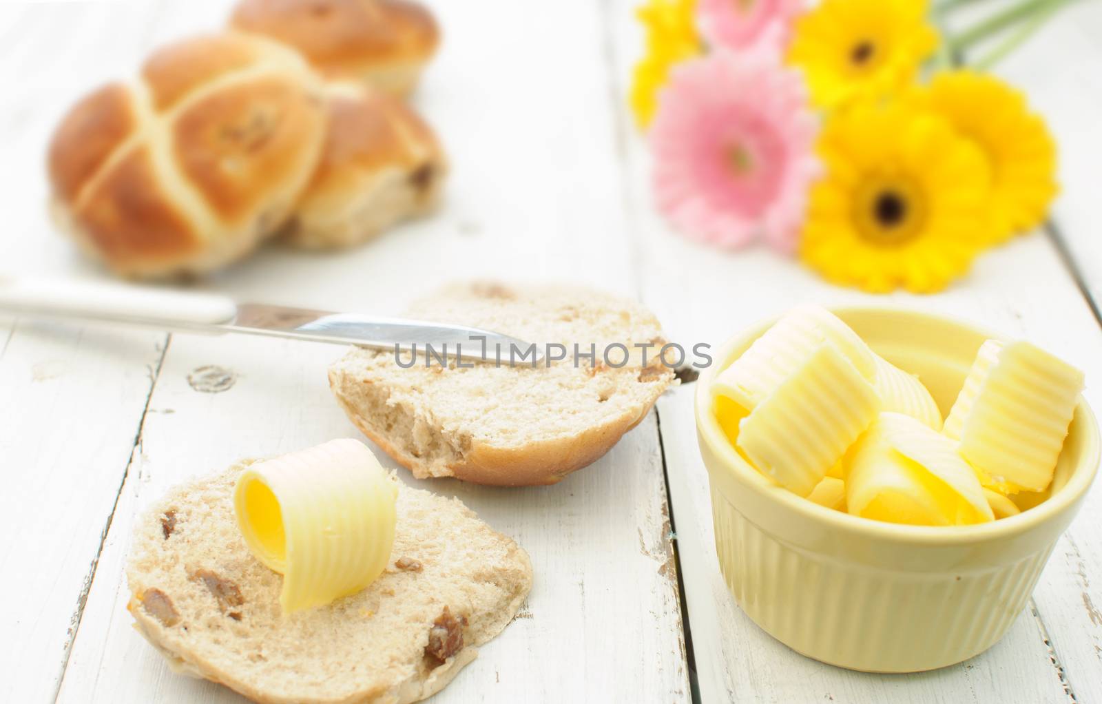 Hot cross bun breakfast with butter curls