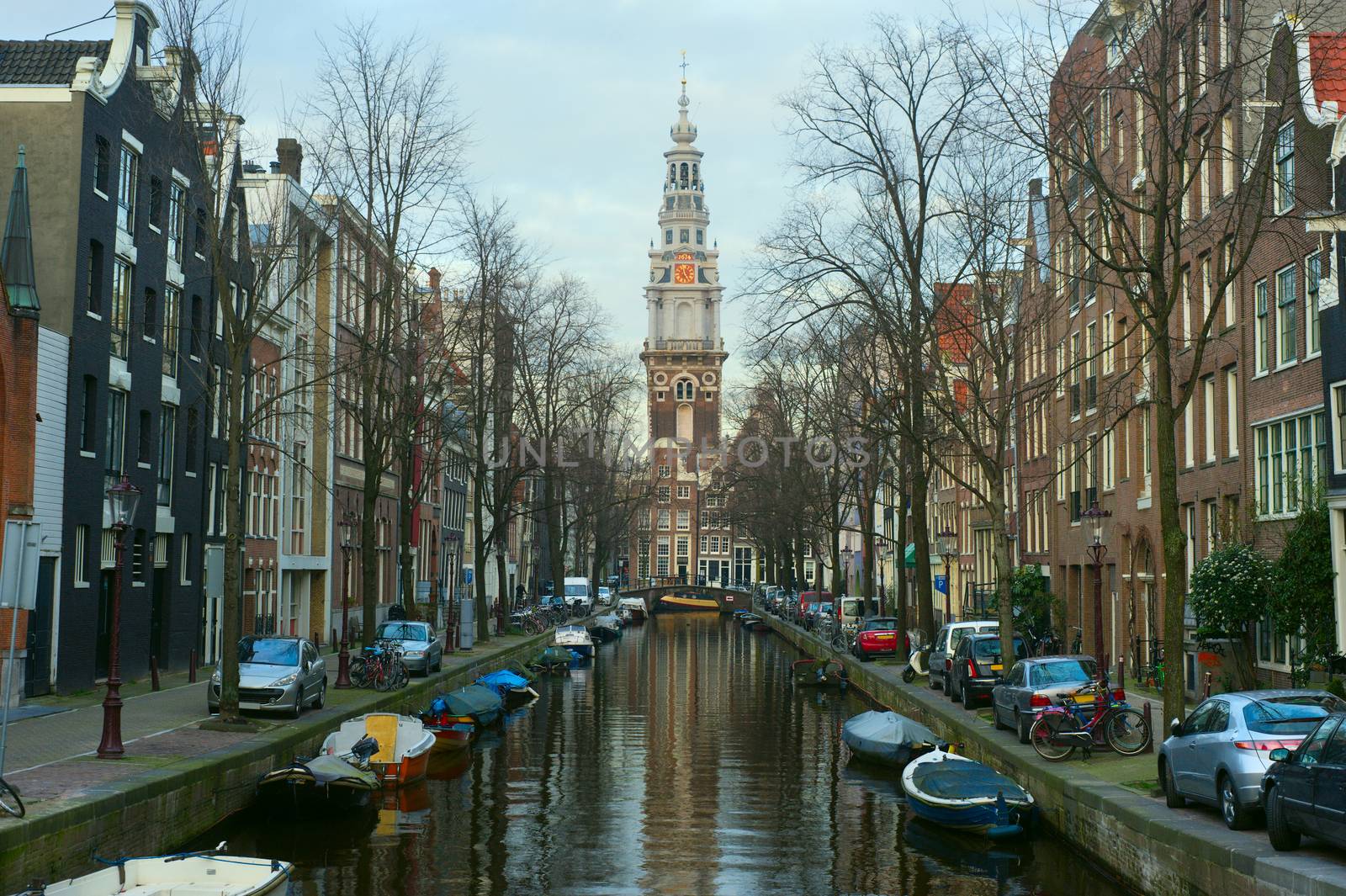 Channel and famous Westerkerk in Amsterdam