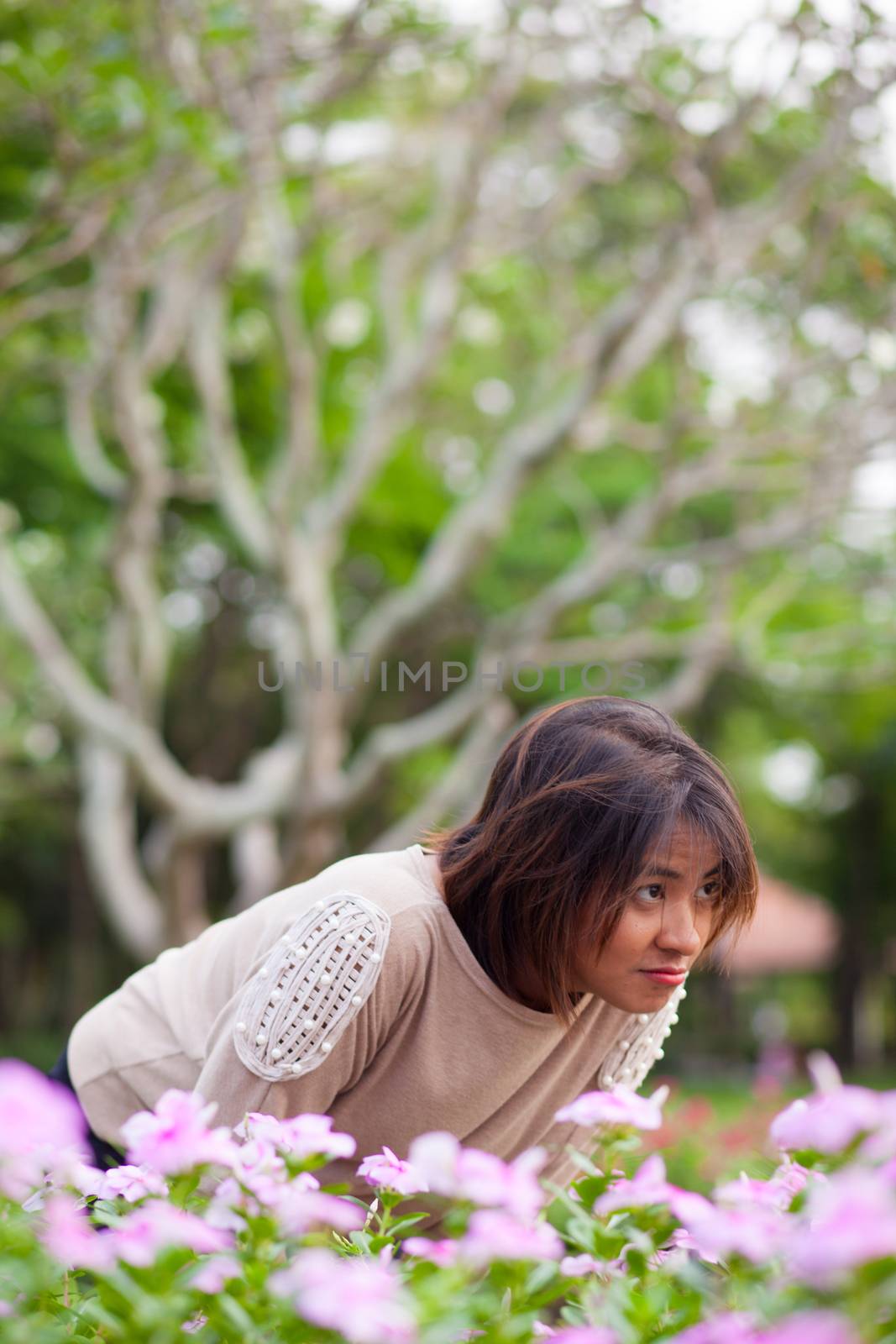 portrait asian woman in park. by a454