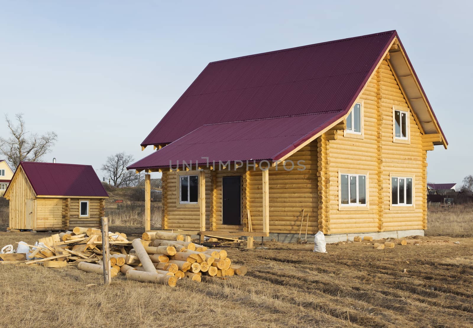 A small wooden house and log cabin bath