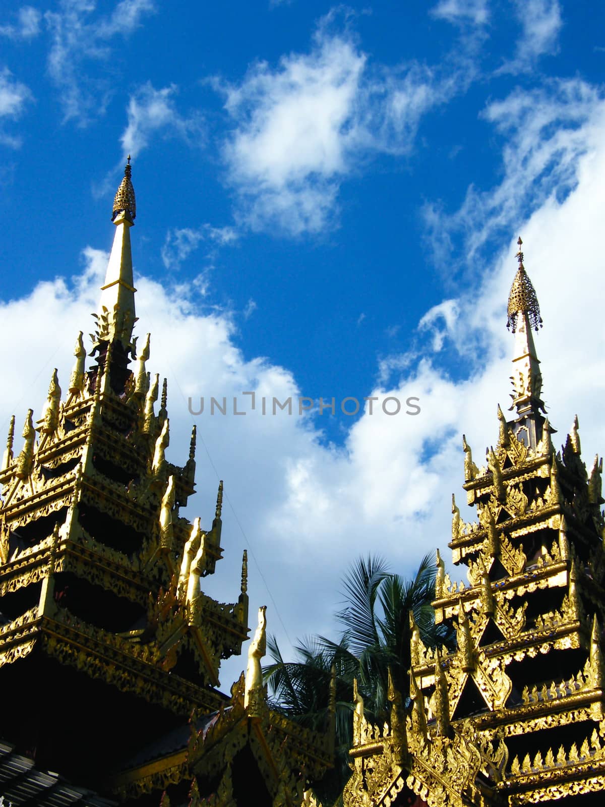 the complicated detail of wooden gate entrance at Wat Sri Chum,Lampang,Thailand