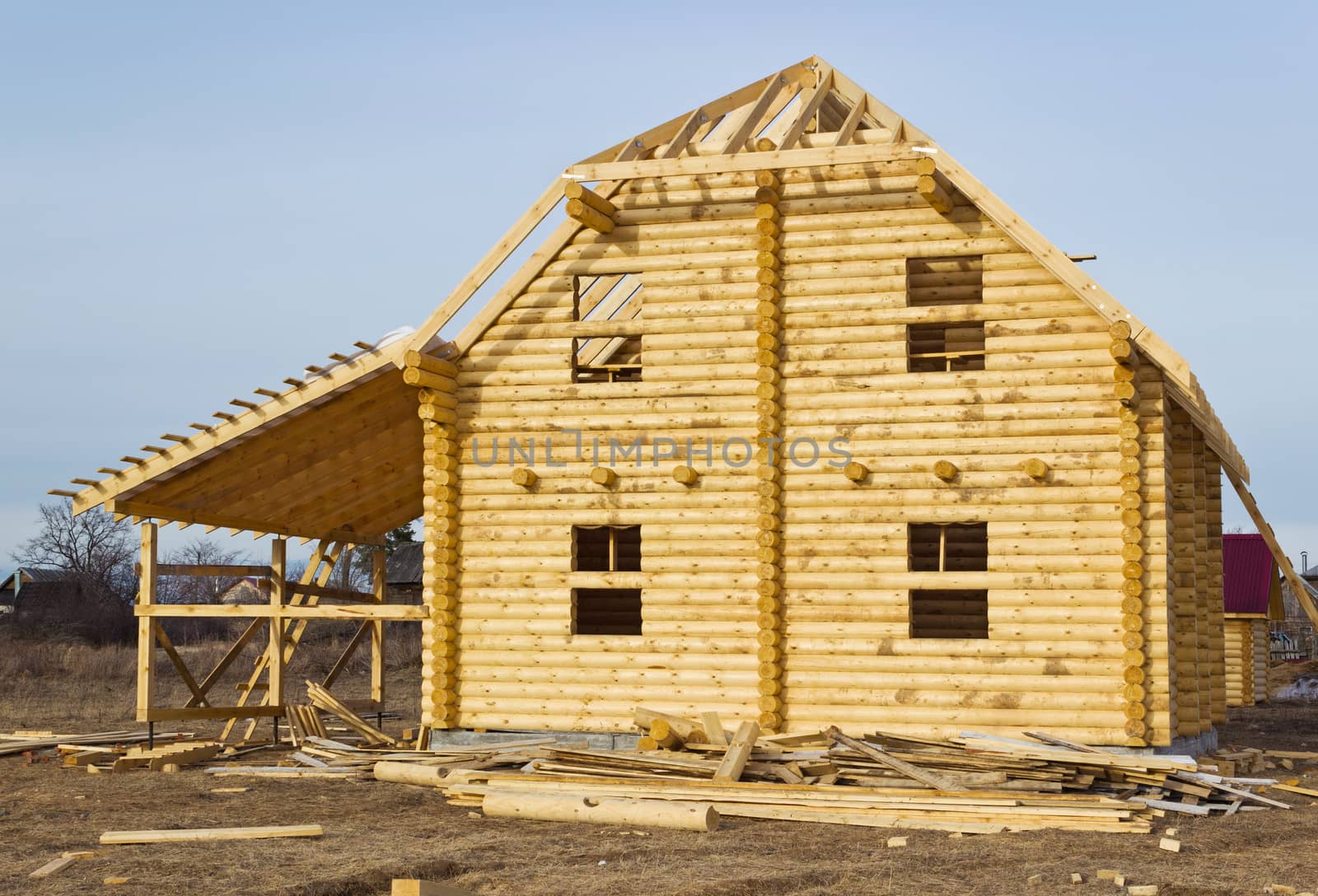 Construction of log houses built on the wasteland