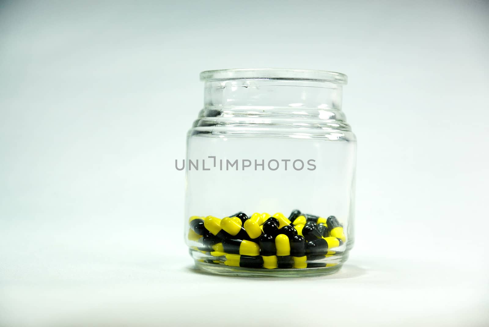 capsules bottle by nattapatt