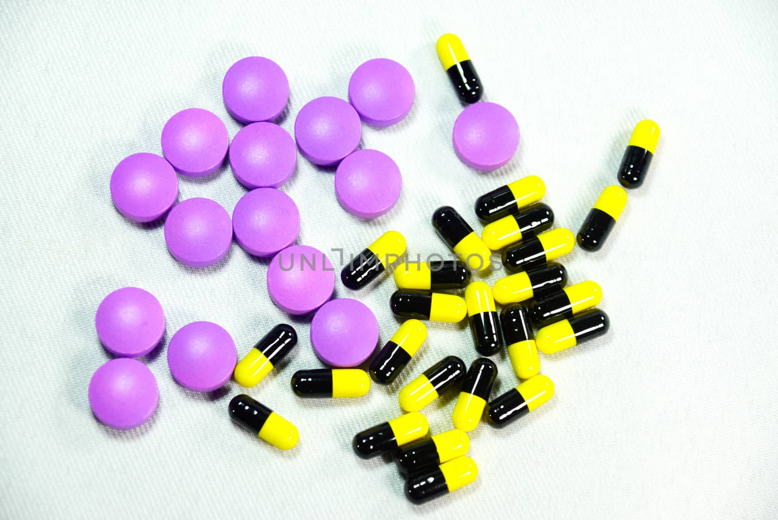 both types of pills on white scene,shallow focus