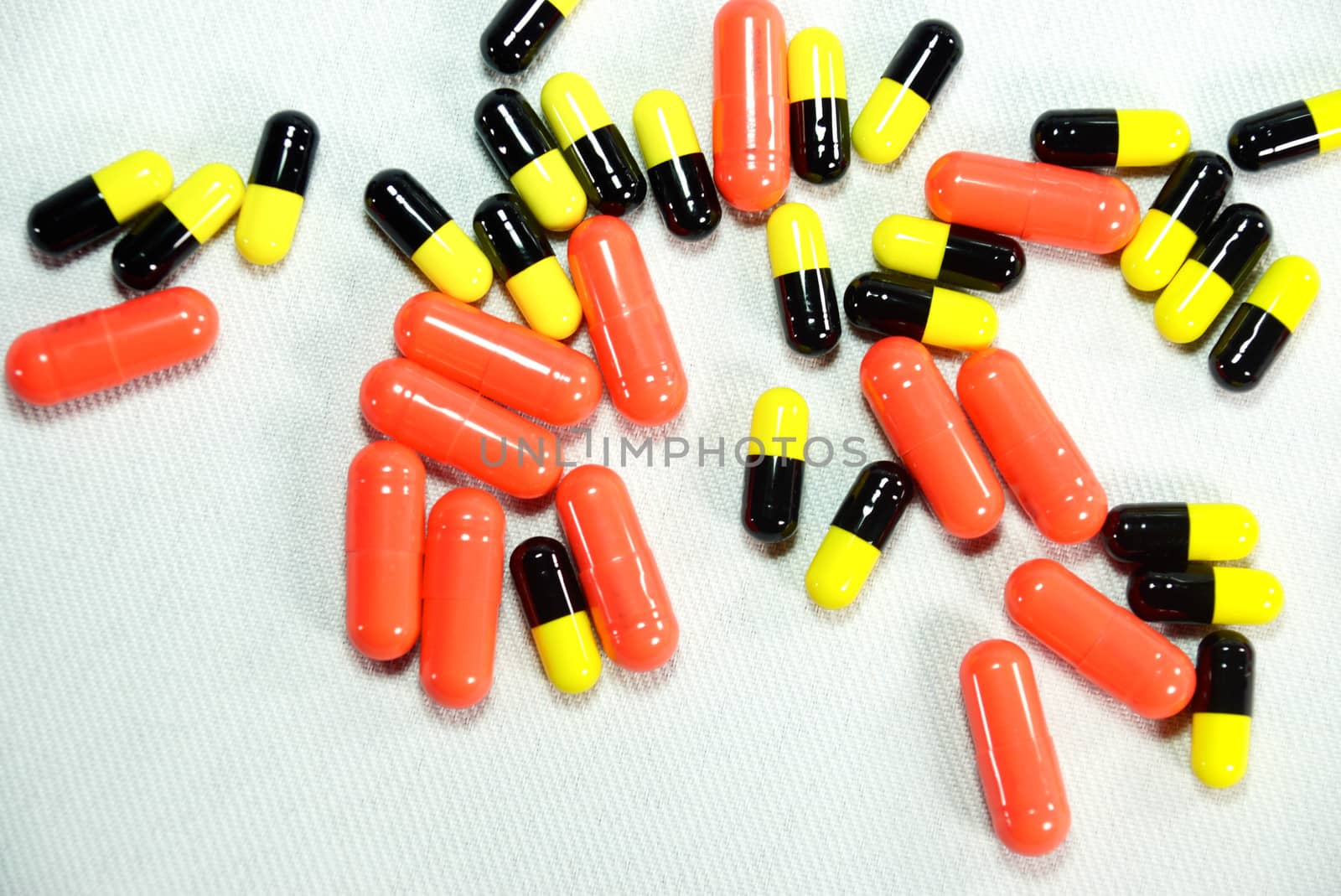 both types of pills on white scene,shallow focus