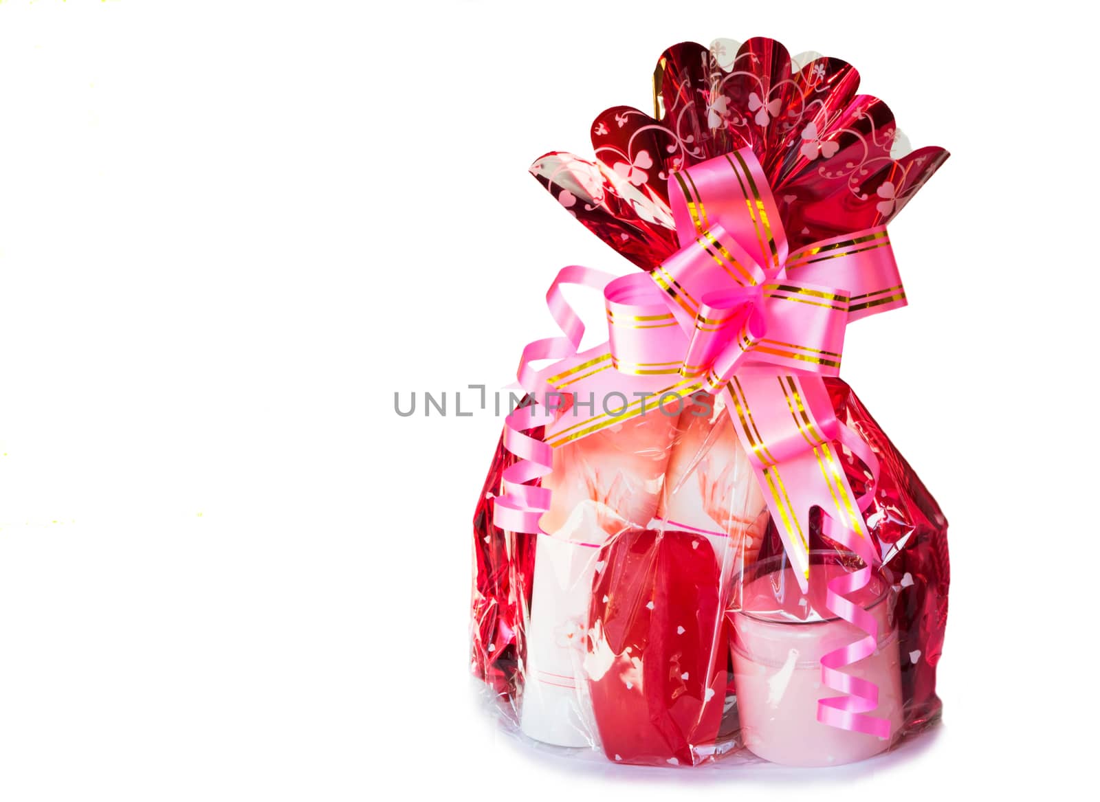 Gift - beautifully packed cosmetics. It is presented on a white background.