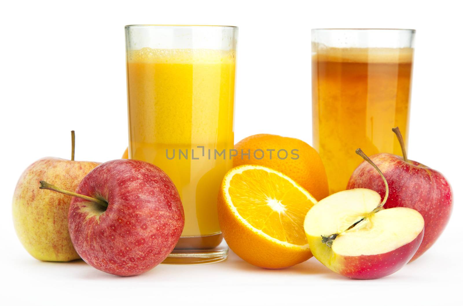 Orange juice and apple juice against a white background
