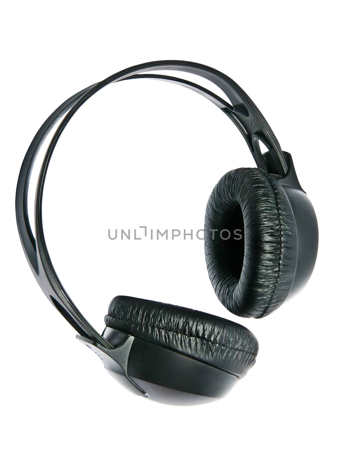Black headphones closed type on a white background. Isolated.