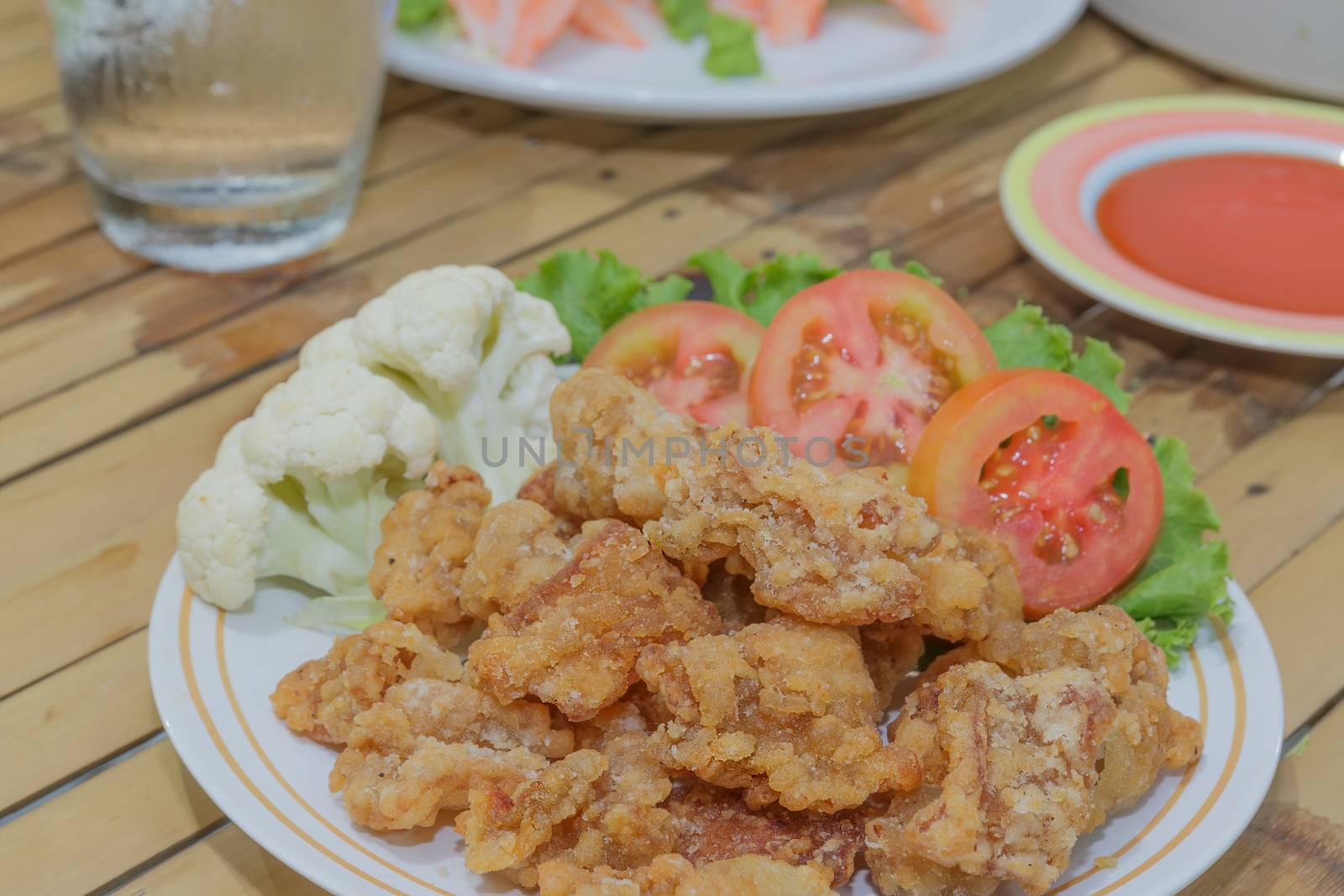 Fried chicken Skin with dip sauce and vegetables