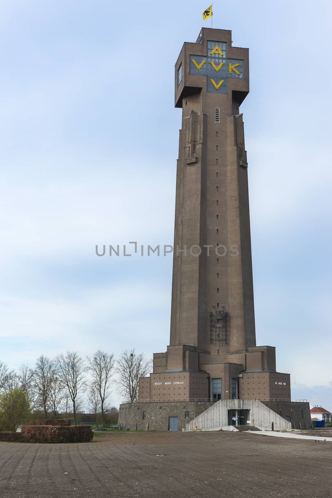 The Ijzertoren, (tower of iron) is the tallest World War I and peace memorial in Flanders, Belgium. In Diksmuide near Ypres along the Yser River. AVV-VVK stands for "All for Flanders, Flanders for Christ." The white characters at the bottom read "Never Again War" in two languages.