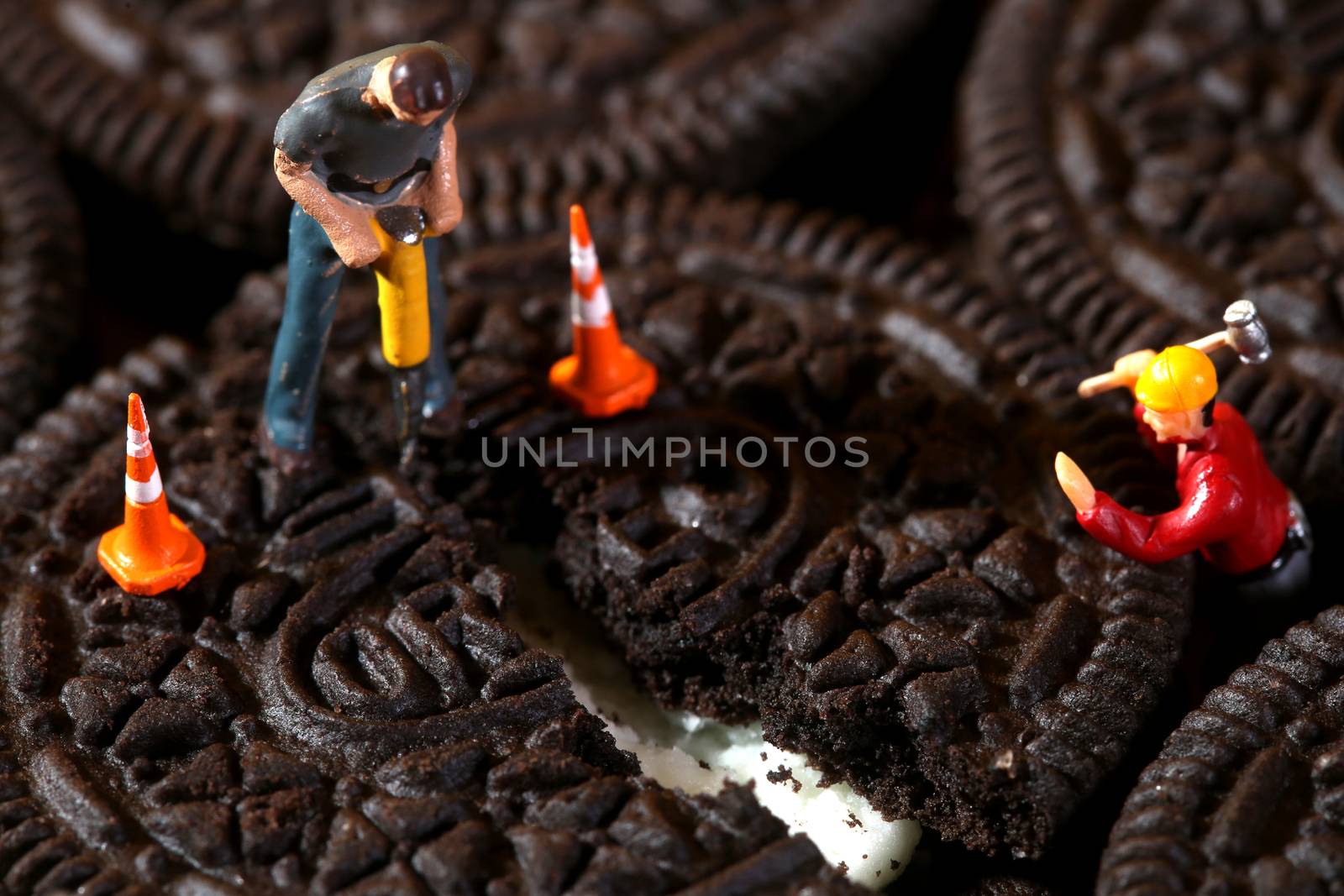 Construction Workers in Conceptual Imagery With Cookies by tobkatrina