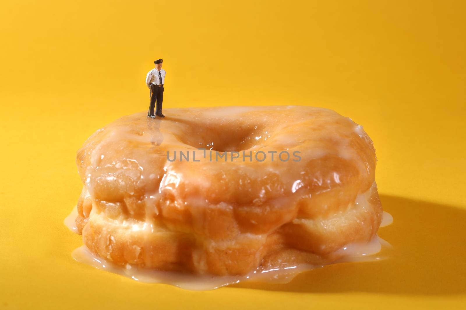 Police Officers in Conceptual Food Imagery With Doughnuts by tobkatrina