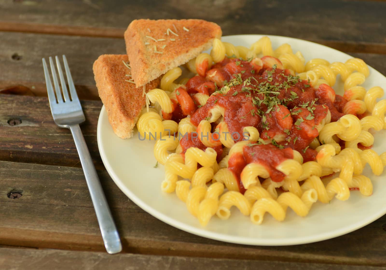 italian dinner with pasta and garlic bread