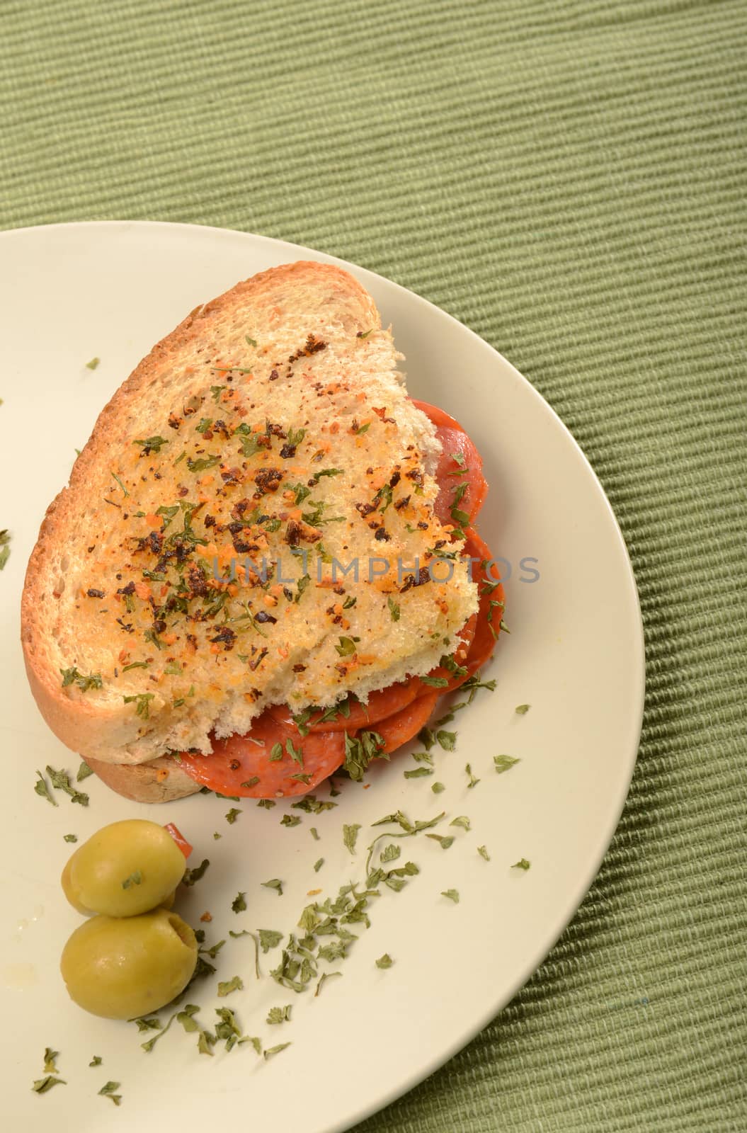 pepperoni sandwich on Italian bread