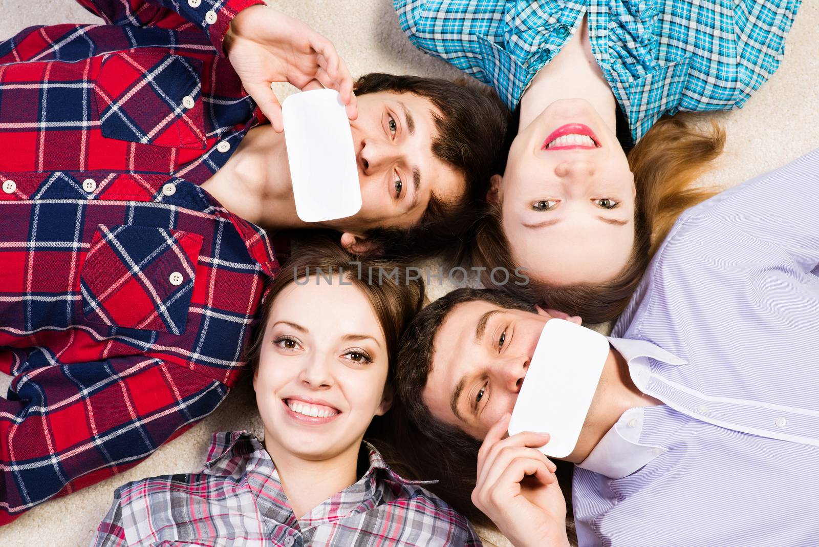 four young men lie together, applied to the face blank card