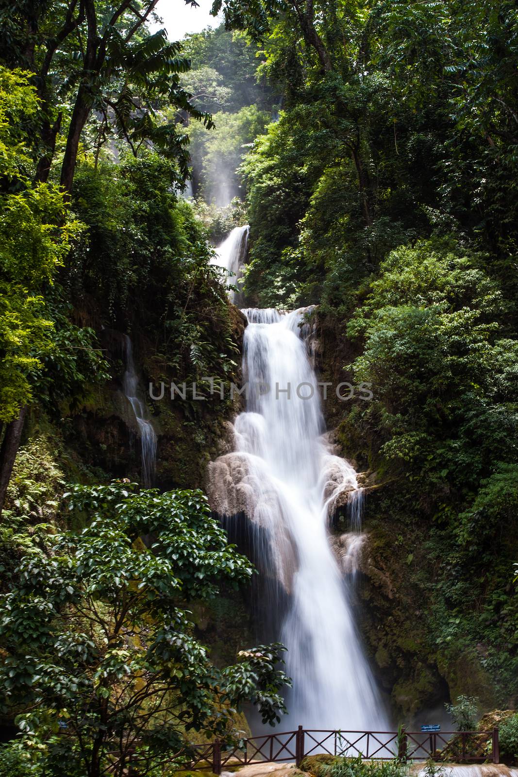 LUANG PRABANG, LAOS : The Kuang Si Falls. The falls begin in shallow pools atop a steep hillside.