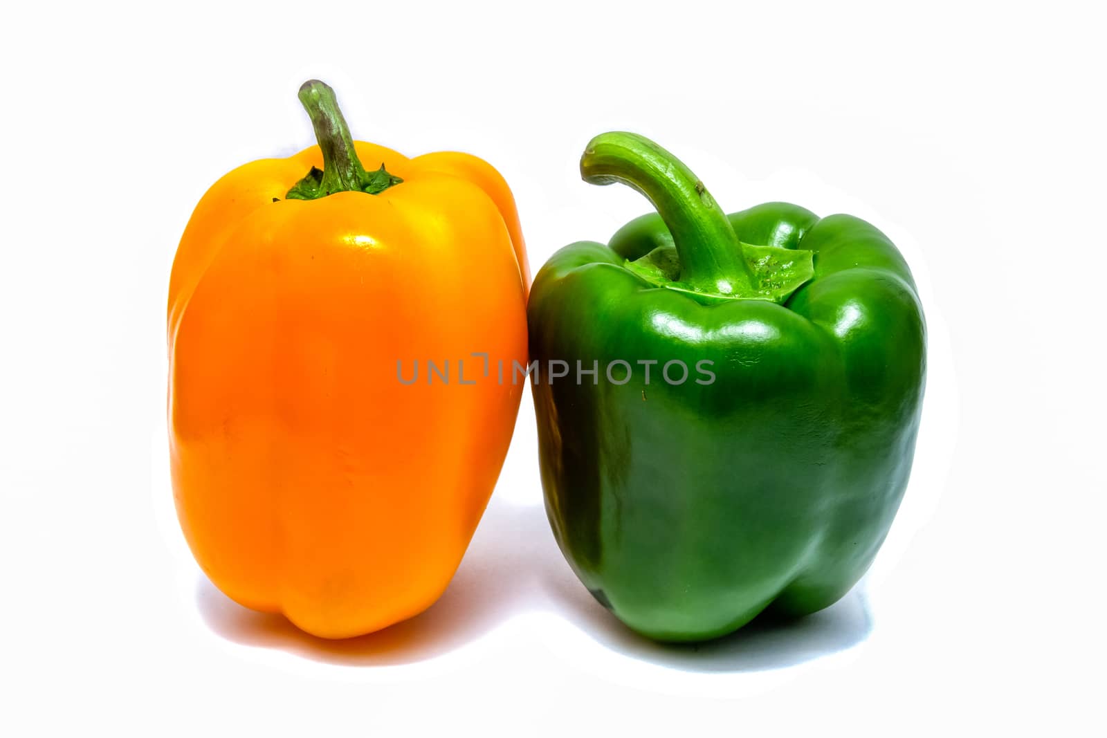 Fresh sweet pepper isolated on white background by kannapon