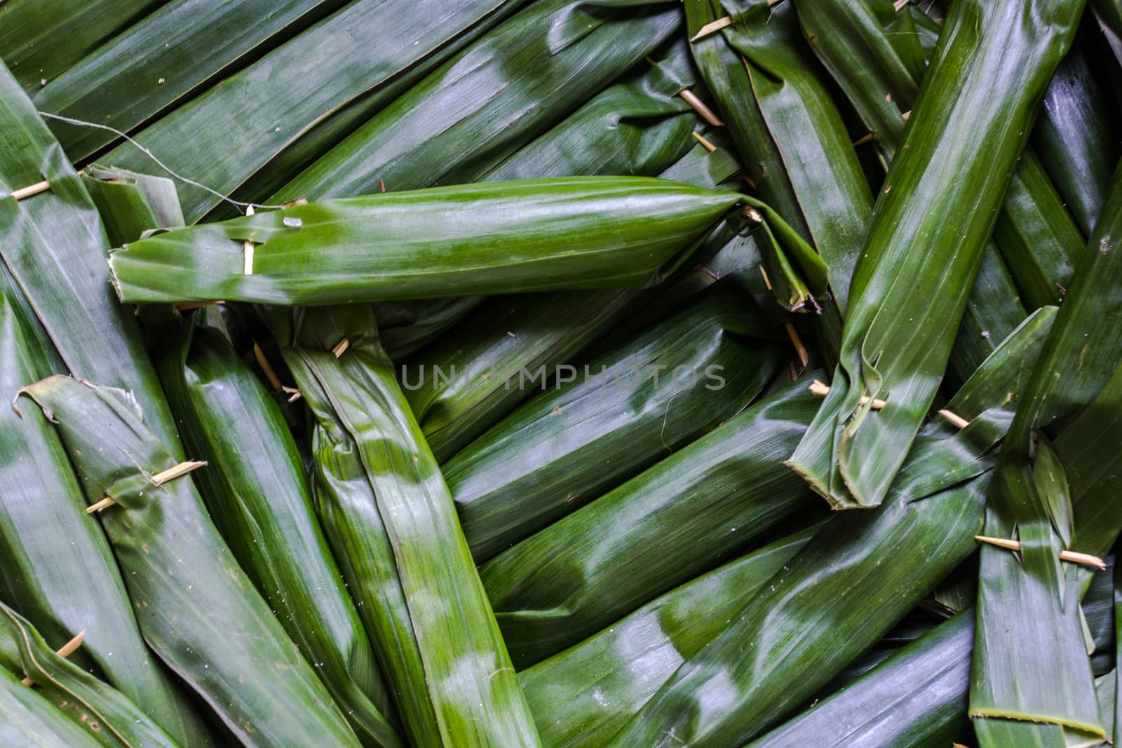 Sticky rice with banana grill on stove by kannapon