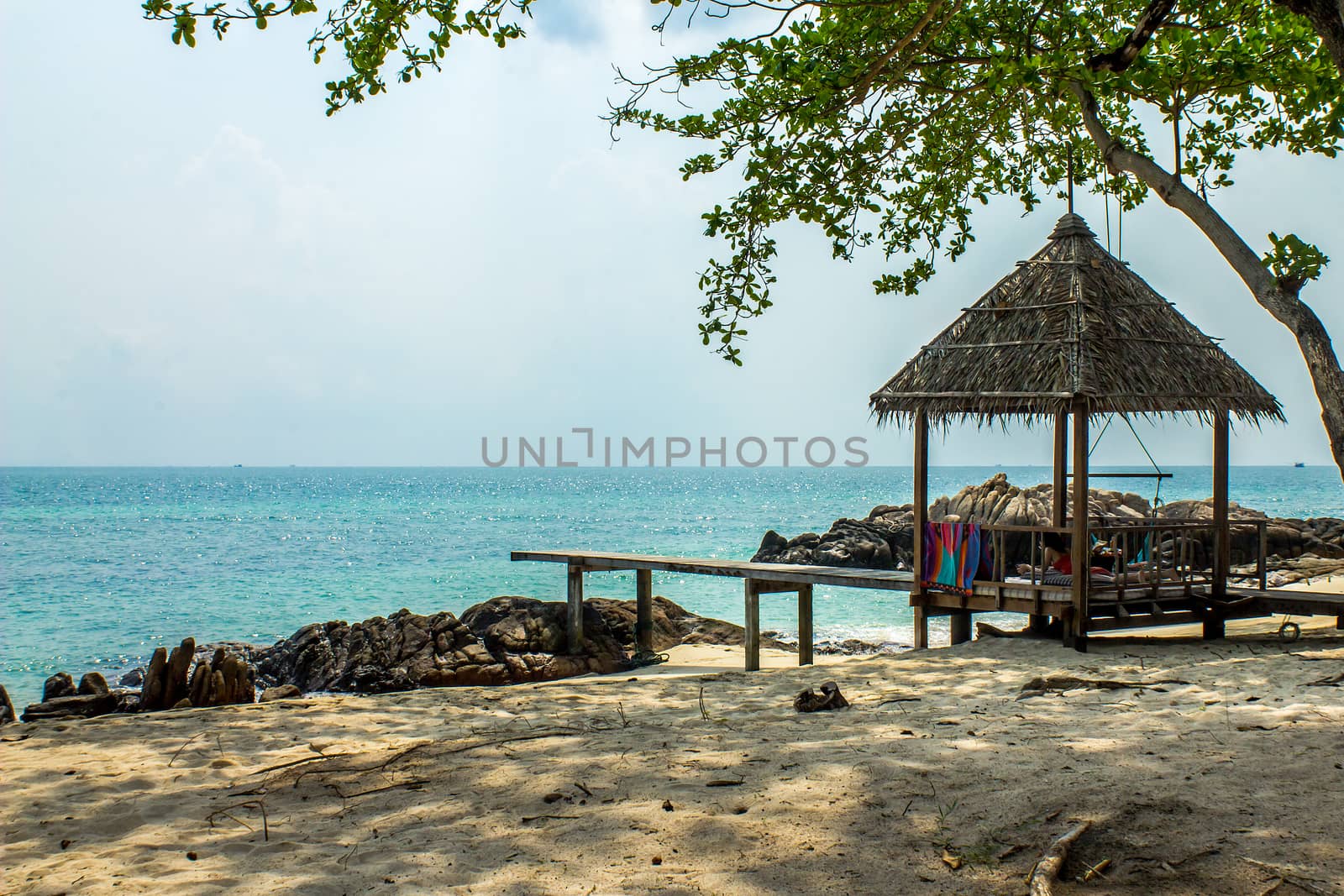 Bamboo hut on beach on sea by kannapon