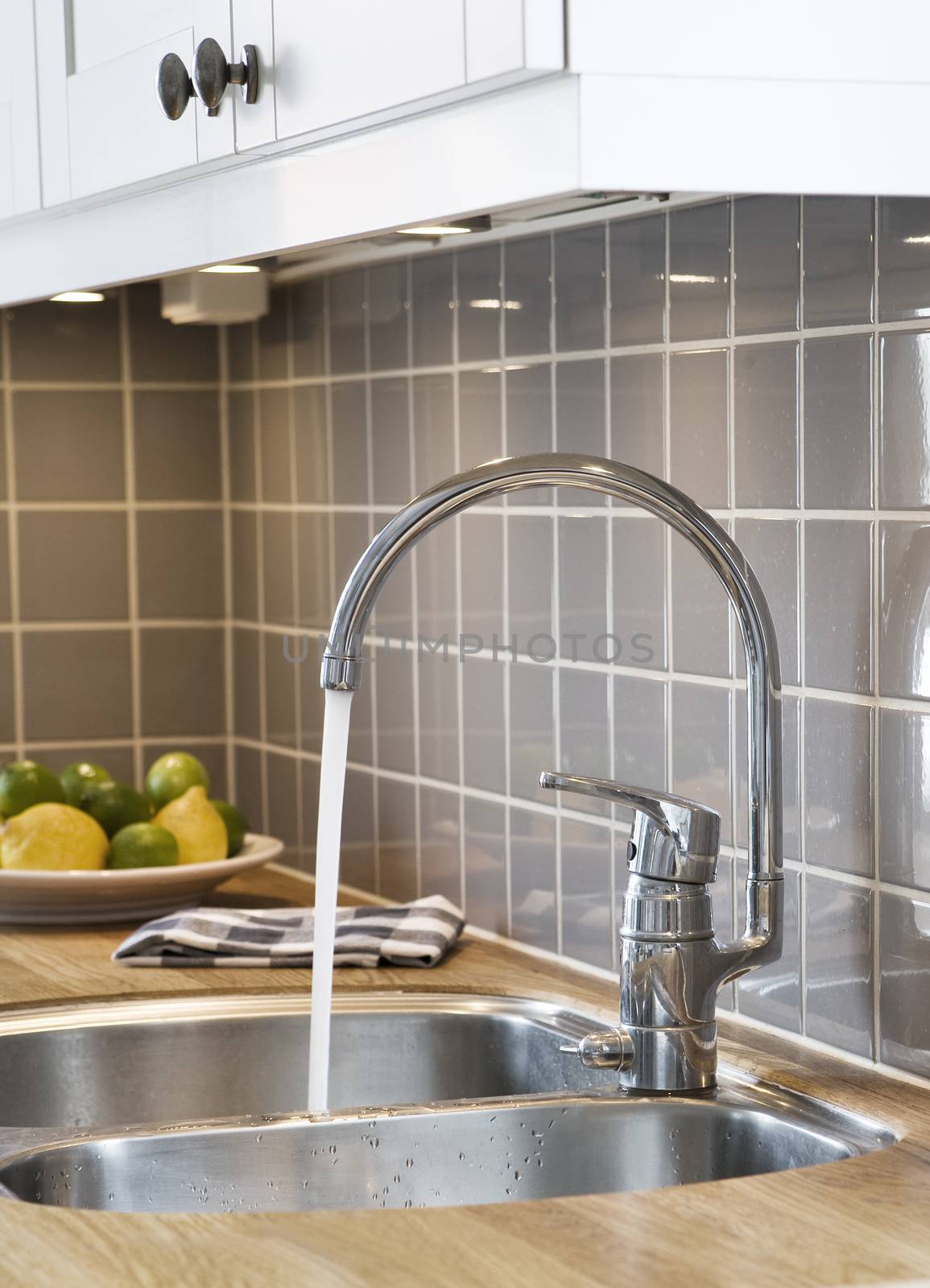 Pouring water in the kitchen