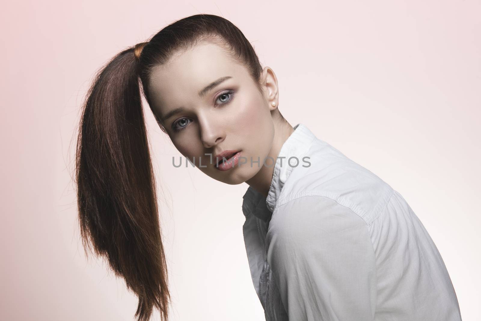 young woman with smooth ponytail by fotoCD
