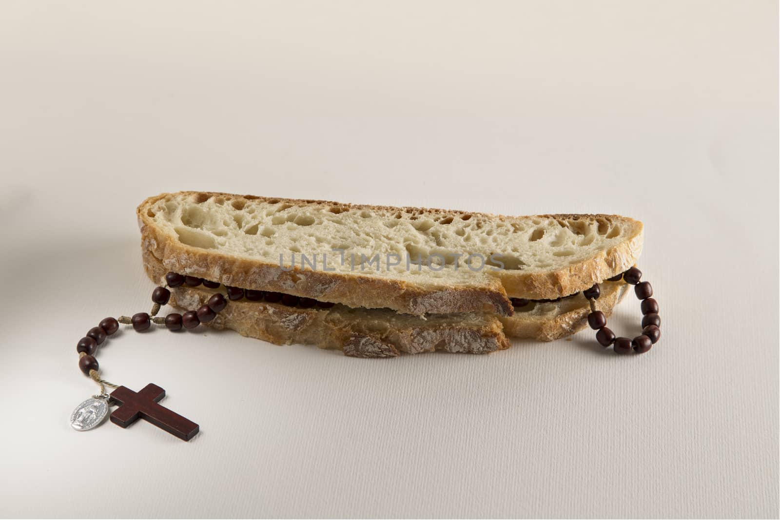 Italian bread and Holy Rosary beads necklace