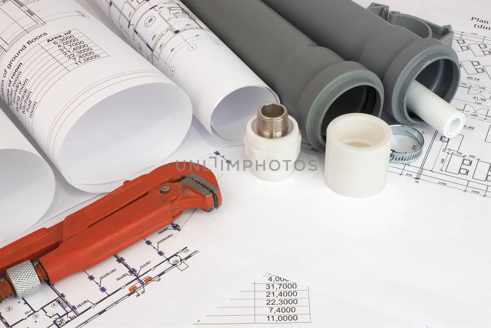 Plumbing tools on the construction drawings. Repair and construction of plumbing system
