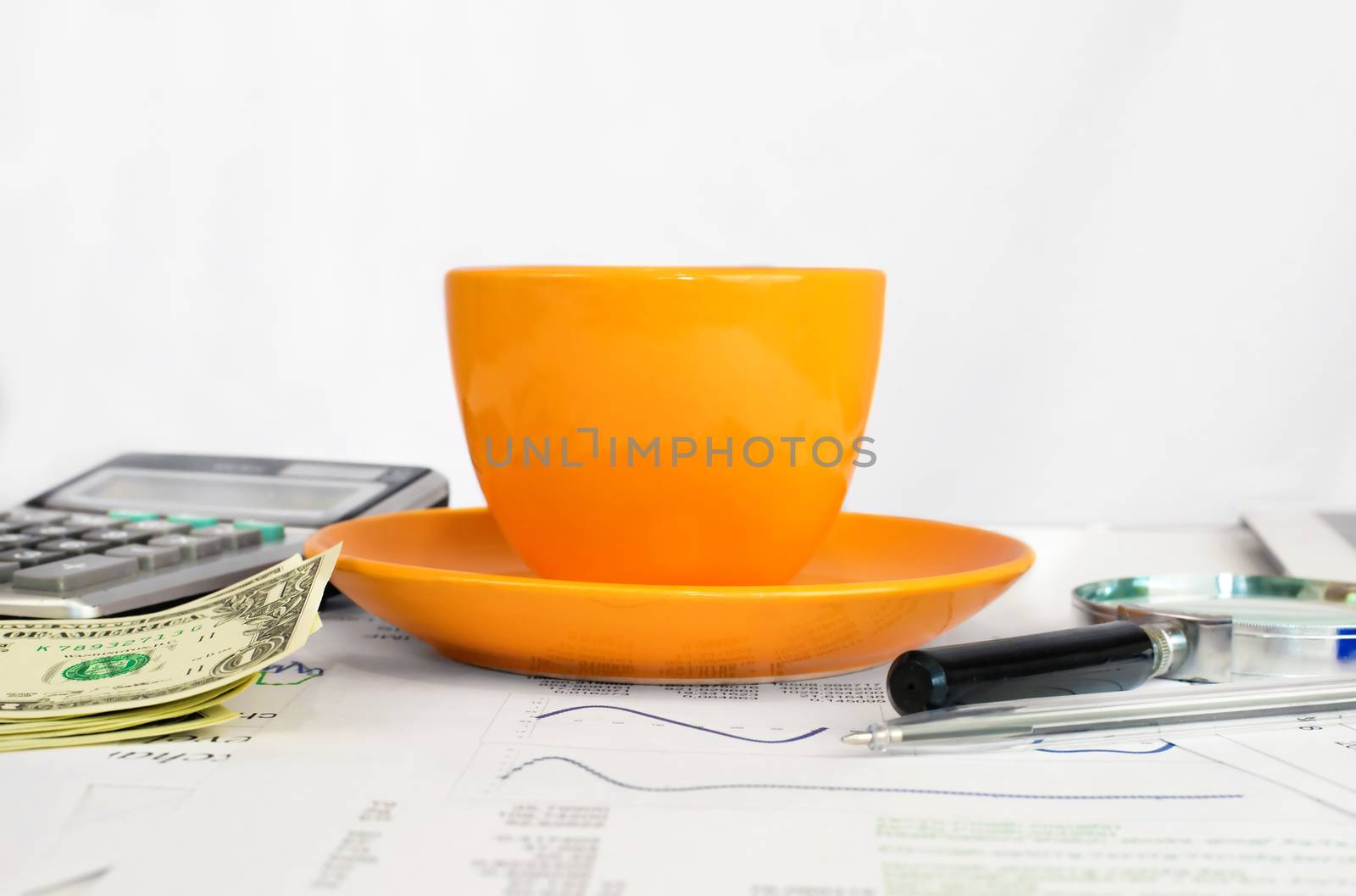 Cup of coffee, business objects and papers by cherezoff